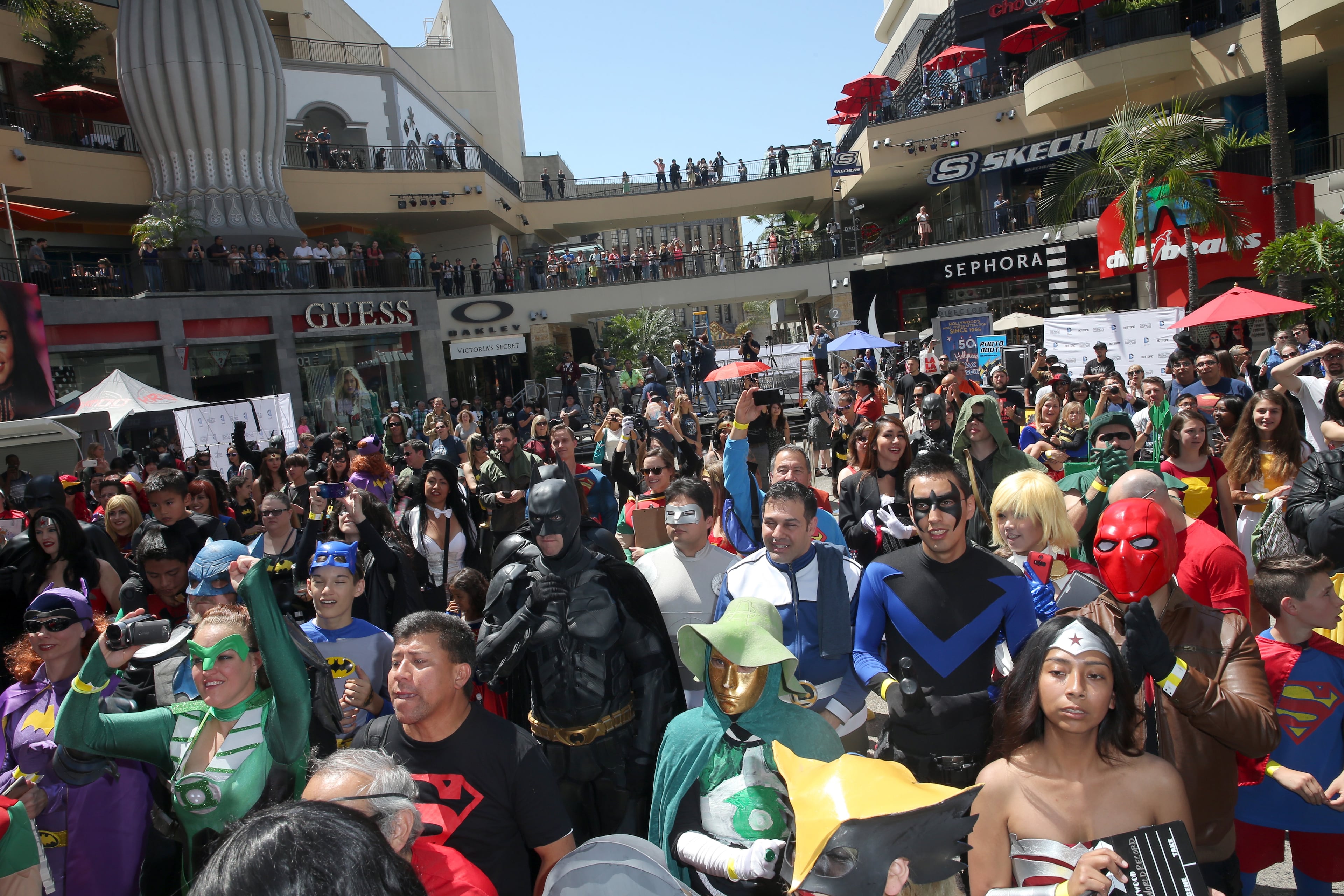 Guinness World Record for most people dressed as DC Comics Super Heroes - LOS ANGELES, CA - APRIL 18: Fans dressed as DC Comics Super Heroes gather to set the Guinness World Record for most people dressed as DC Comics Super Heroes within a 24-hour period at the DC Comics Super Hero World Record Event at the Hollywood & Highland Center on April 18, 2015 in Los Angeles, California. (Photo by Imeh Akpanudosen/Getty Images for Warner Bros. Consumer Products)