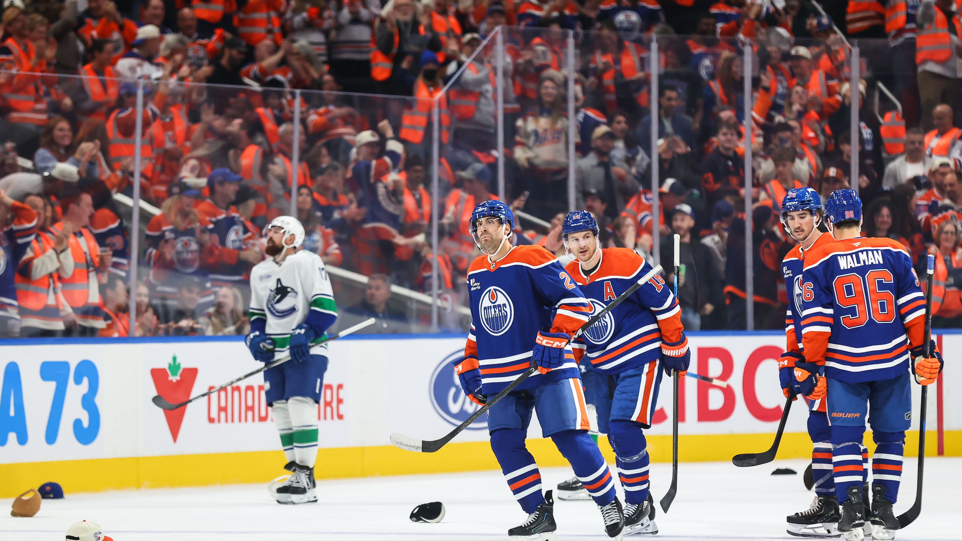 Edmonton Oilers' Evan Bouchard (2) celebrates his hat trick goal against the Vancouver Canucks during third period NHL hockey action in Edmonton on Tuesday, Sept. 29, 2026. (Codie McLachlan/The Canadian Press via AP)