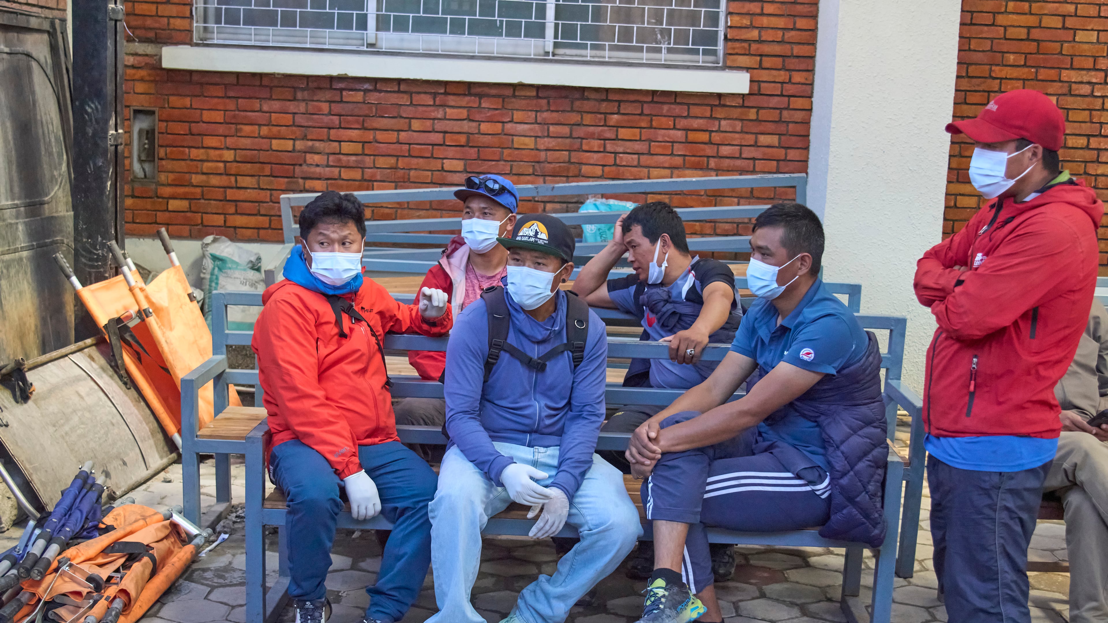 Family members and friends of Nepali climbers gather as the bodies of Nepali climbers recovered after an avalanche on Mount Himlung lie at the morgue of a hospital in Kathmandu, Nepal, Monday, Sept. 28, 2026. (AP Photo/Niranjan Shrestha)