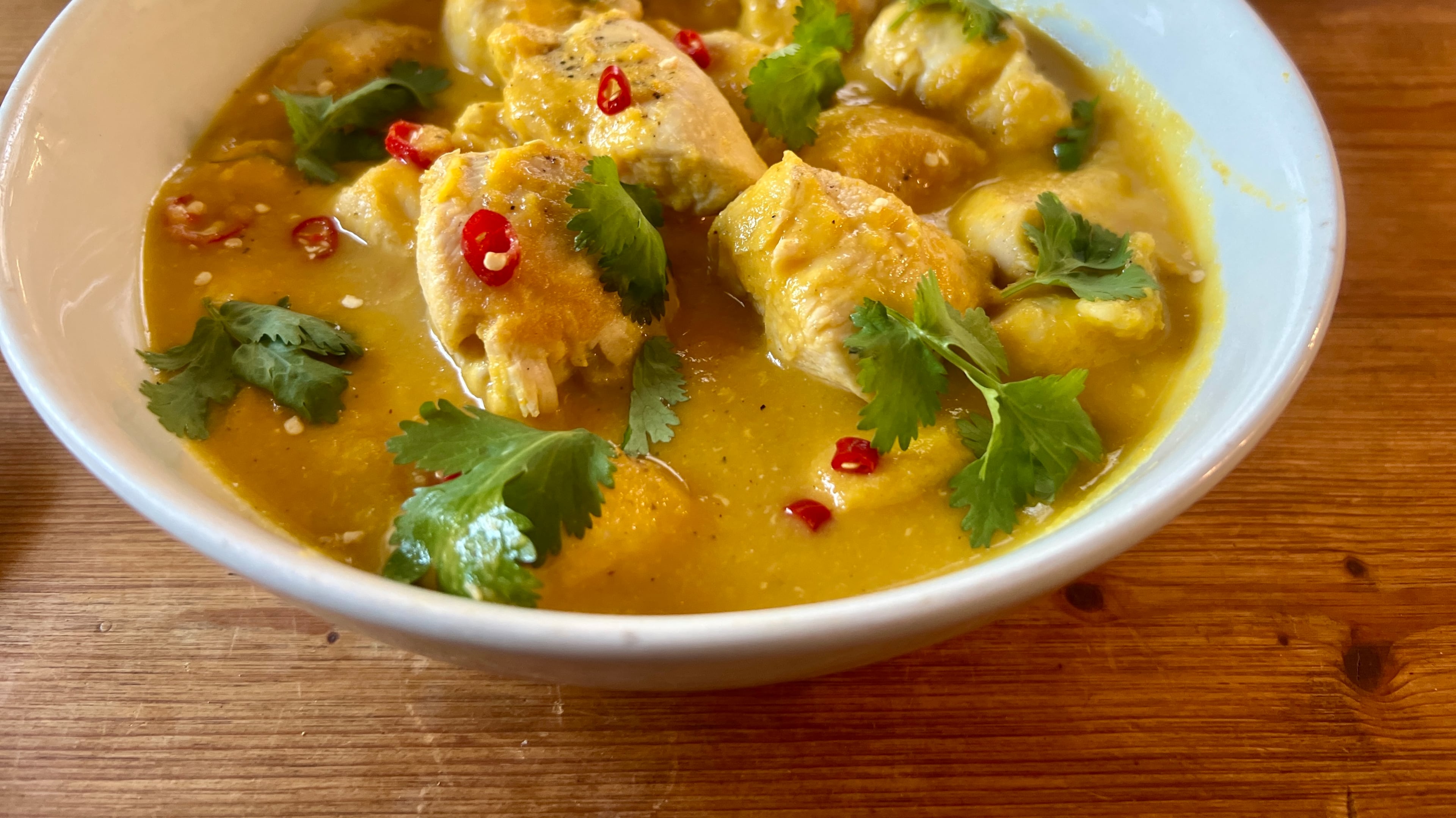 Enjoy this healthier version of orange chicken featuring tender pieces of chicken in a light orange sauce flavored with garlic and ginger. (Virginia Willis for the AJC)