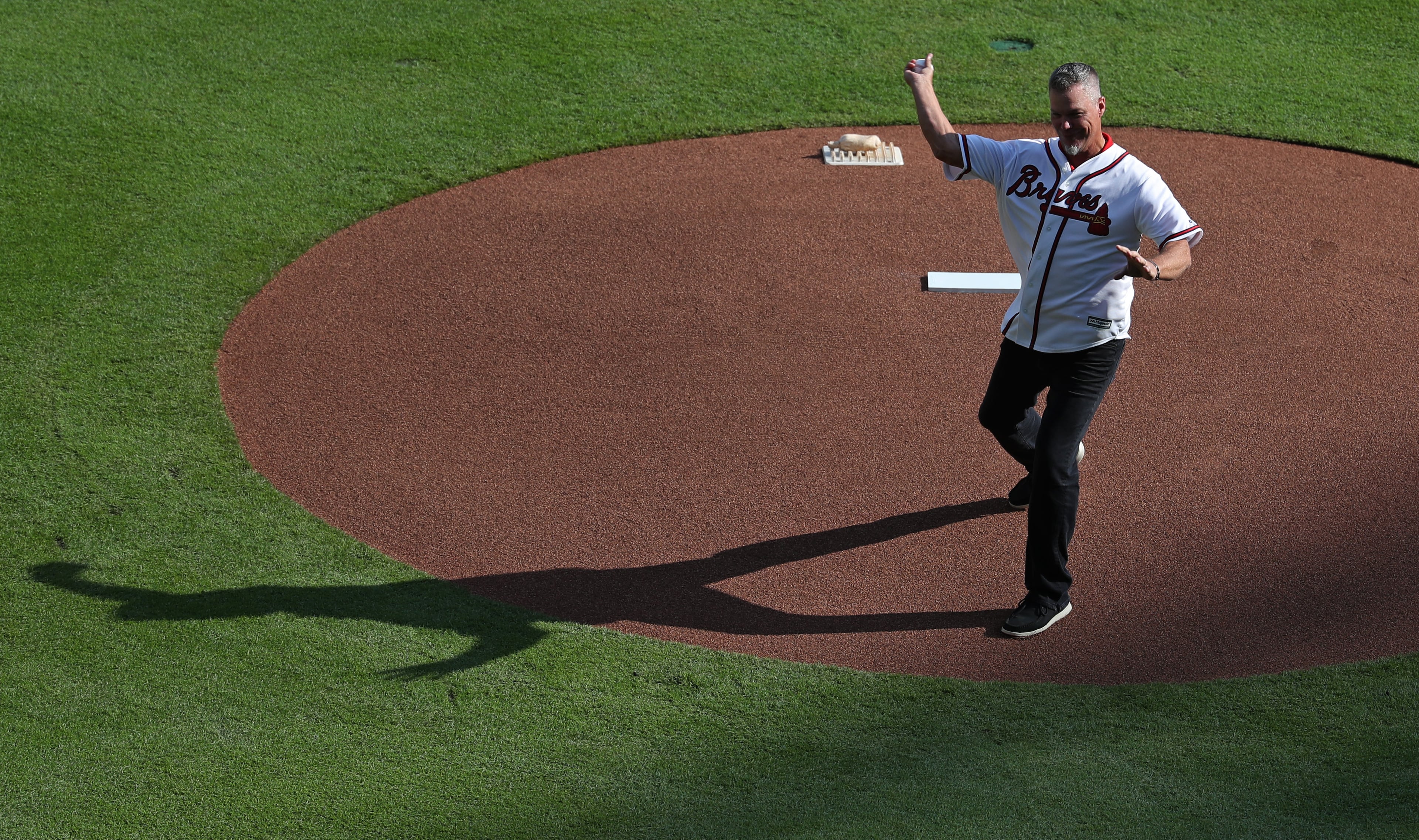 Braves great Chipper Jones throws out the ceremonial first pitch. (JASON GETZ/SPECIAL TO THE AJC)