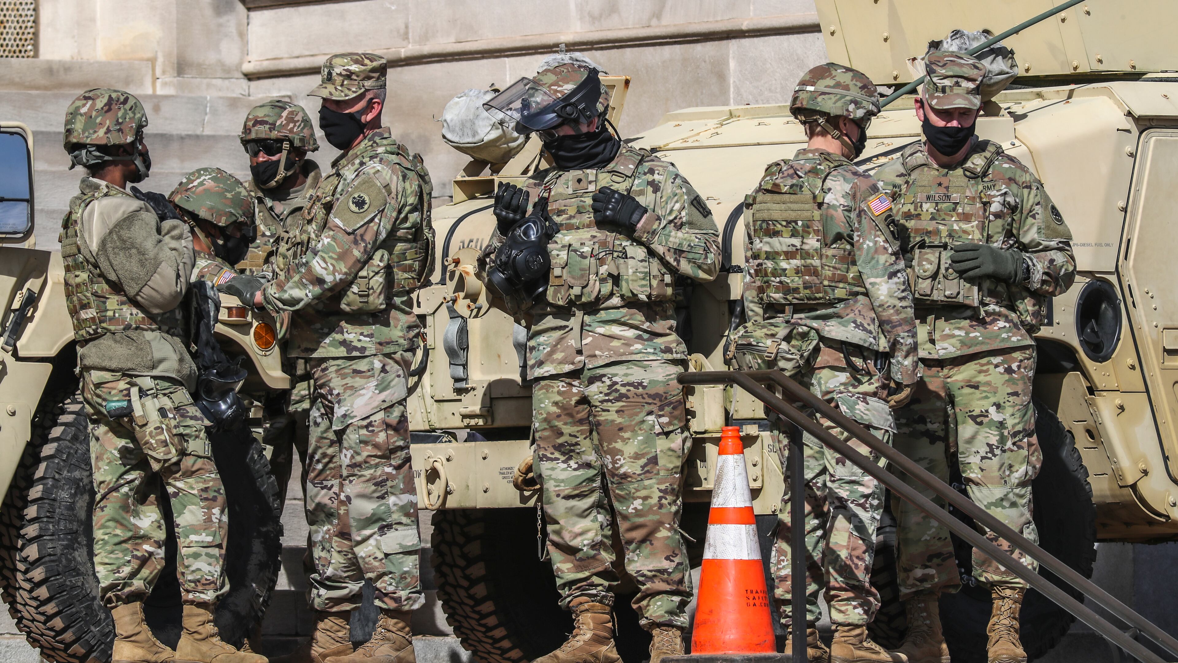 The Georgia National Guard, the State Patrol and other law enforcement agencies surrounded the Georgia Capitol building again on Wednesday, Jan. 20, 2021, with military equipment. Federal education officials are proposing new regulations to crack down on for-profit colleges they say recruit veterans with deceptive claims about degrees and job placement. (John Spink / John.Spink@ajc.com)