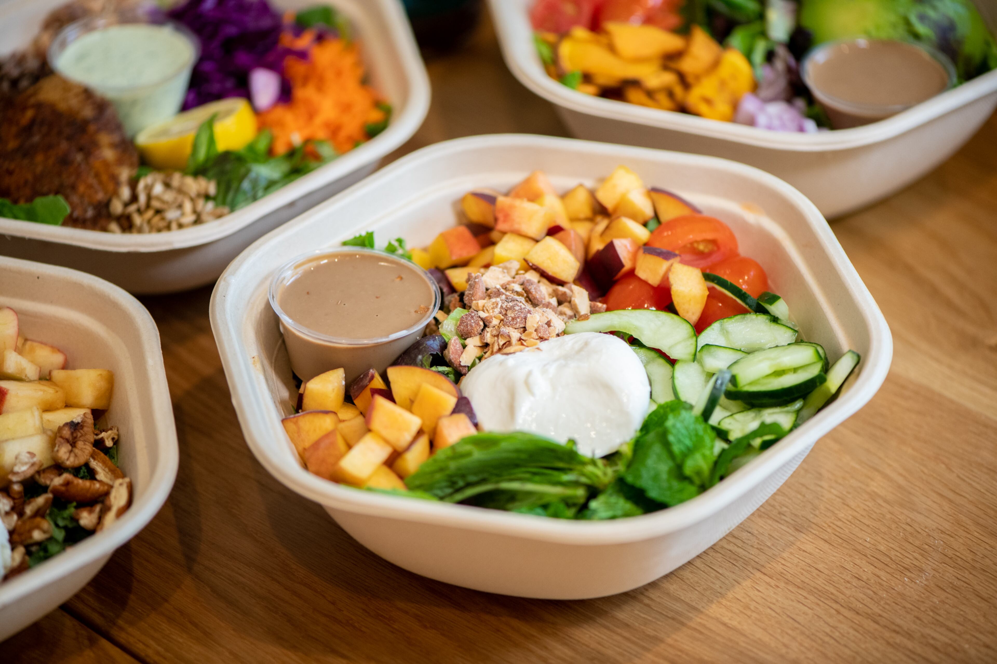 Sweetgreen Peach and Burrata salad. (Mia Yakel for The Atlanta Journal-Constitution)