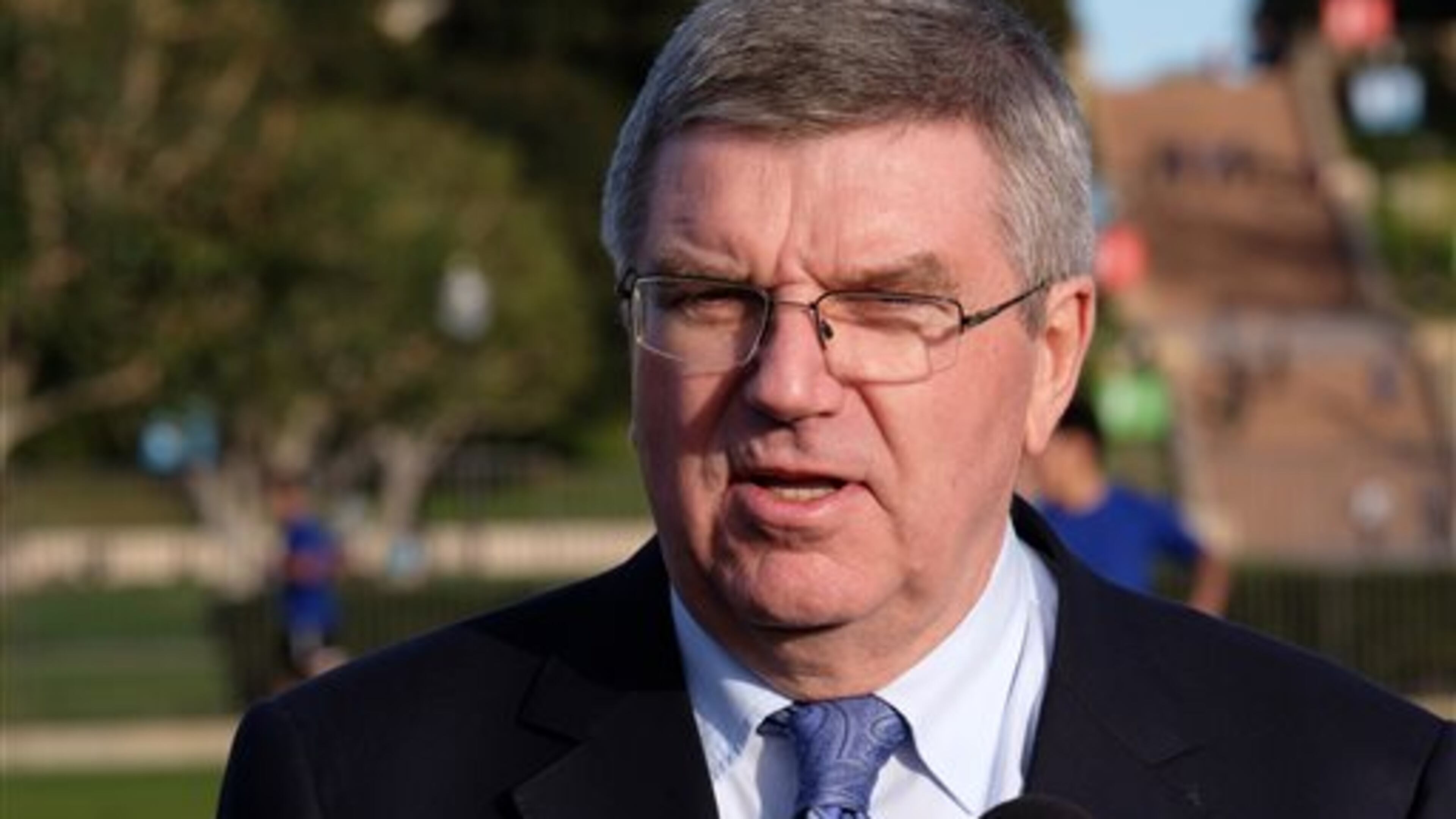 International Olympic Committee President Thomas Bach, talks during a news conference at UCLA, Monday, Feb. 1, 2016. Bach is visiting Los Angeles to check out proposed venues for the 2024 Olympic Games. Thomas Bach's visit to the University of Southern California and UCLA campuses, as well as the Getty Center. (AP Photo/Richard Vogel)