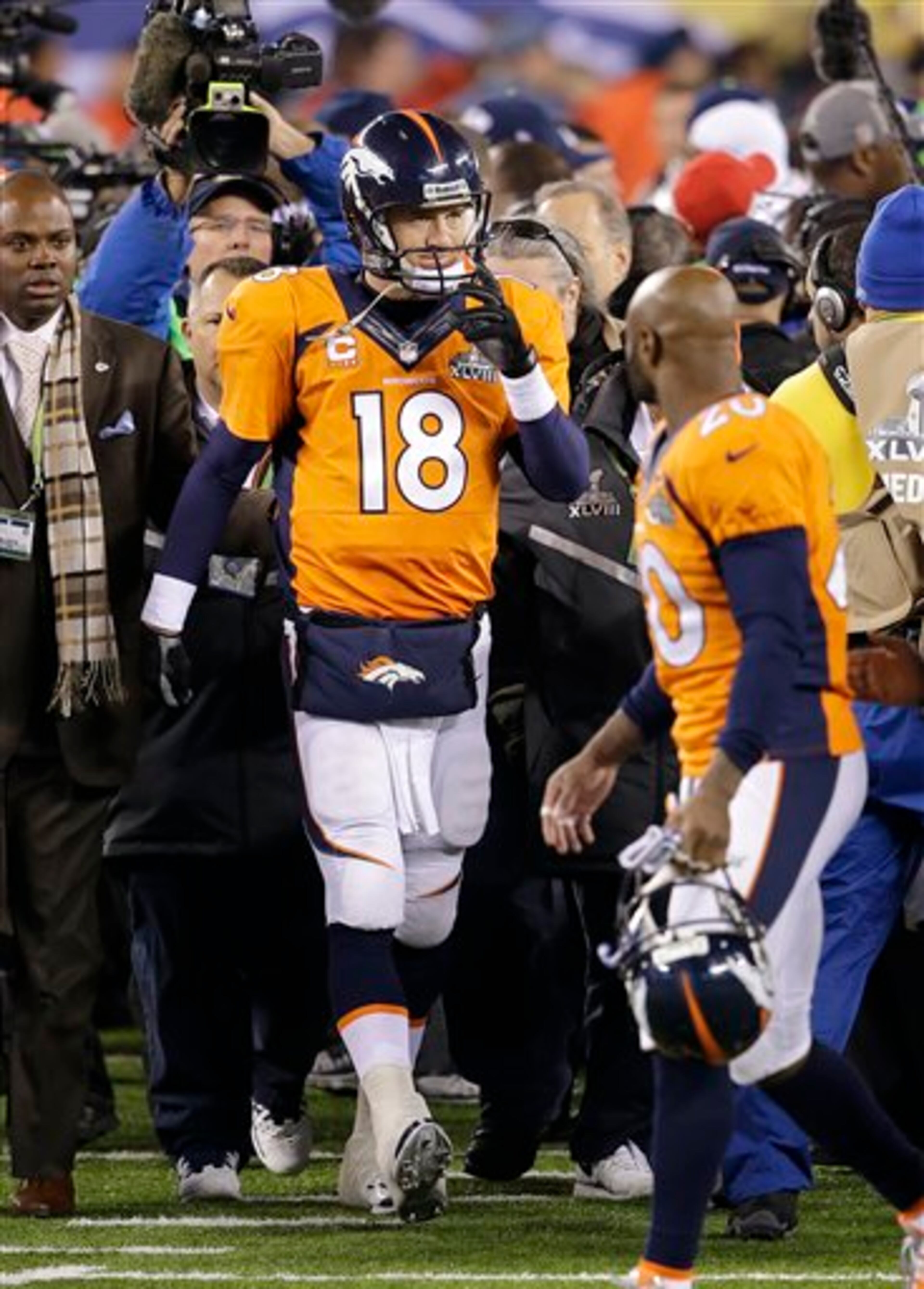 Denver Broncos' Peyton Manning walks off the field after the NFL Super Bowl XLVIII football game against the Seattle Seahawks Sunday, Feb. 2, 2014, in East Rutherford, N.J. The Seahawks won 43-8. (AP Photo/Chris O'Meara)