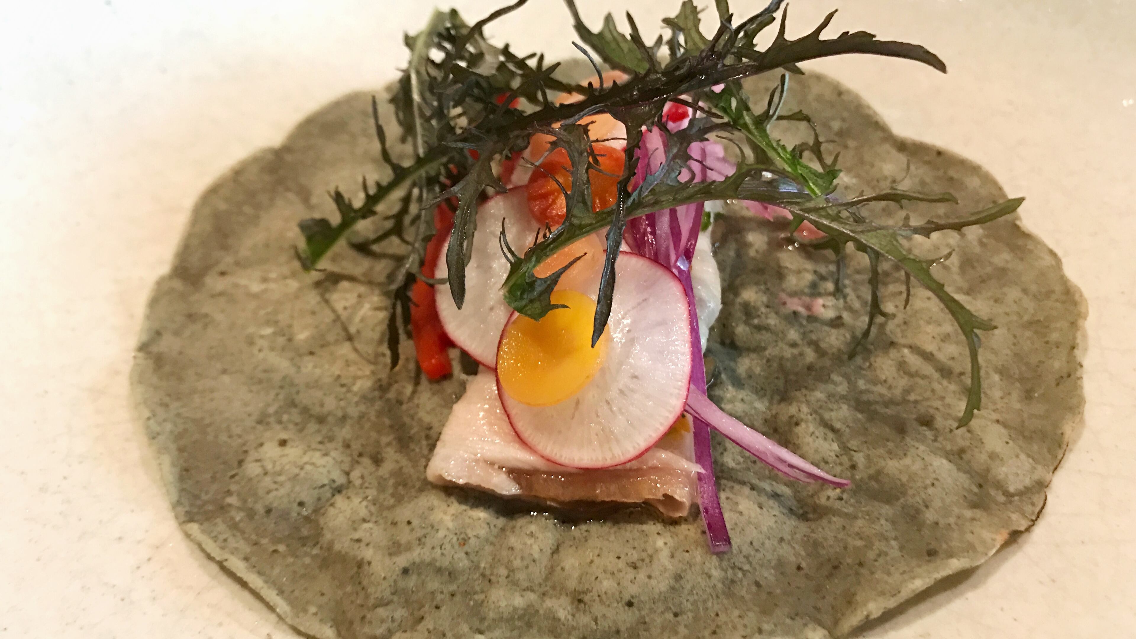 Pork belly taco from the omakase taco bar at Pujol in Mexico City. (Leslie Brenner/Dallas Morning News/TNS)