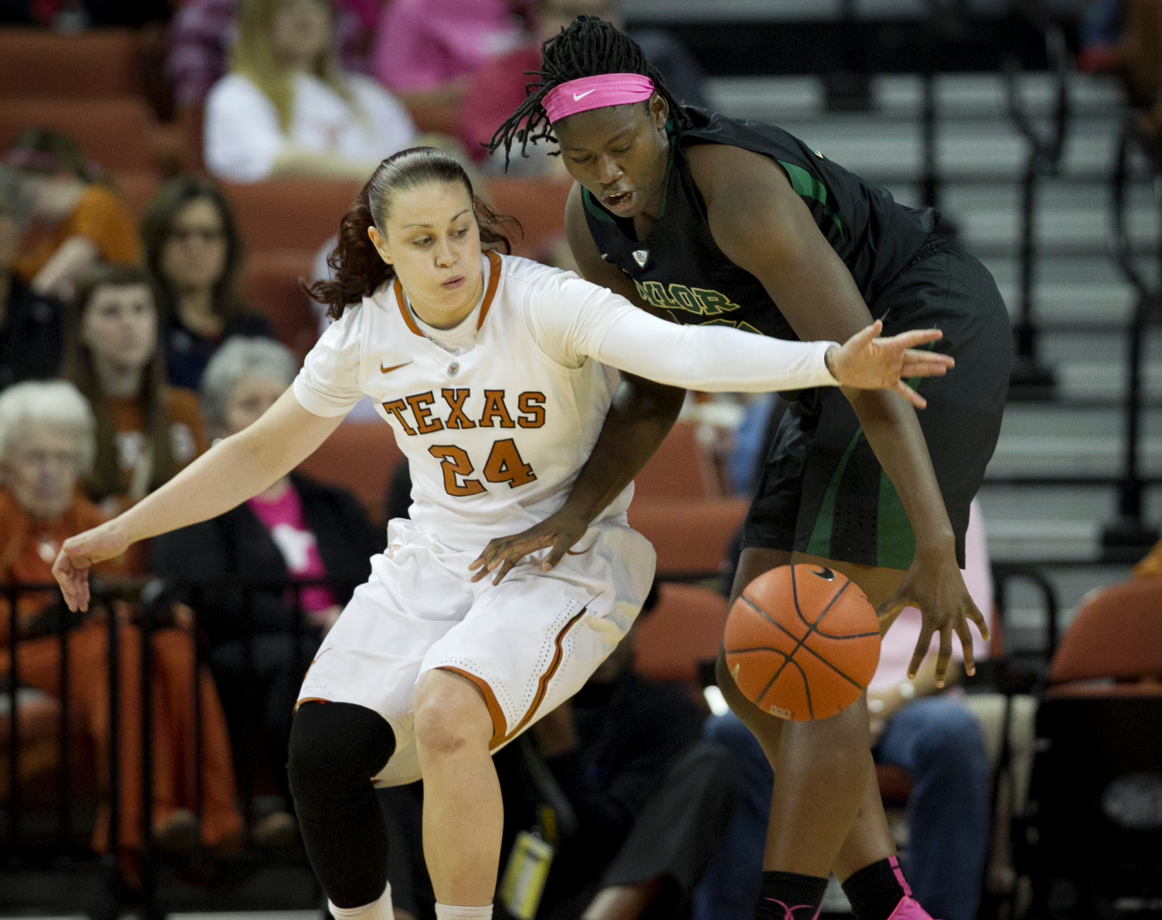 UT's Chassidy Fussell, left, and Baylor's Sune Agbuke go for the ball at the Frank Erwin Center on Sunday, Feb. 16, 2014. Baylor won 72-56.