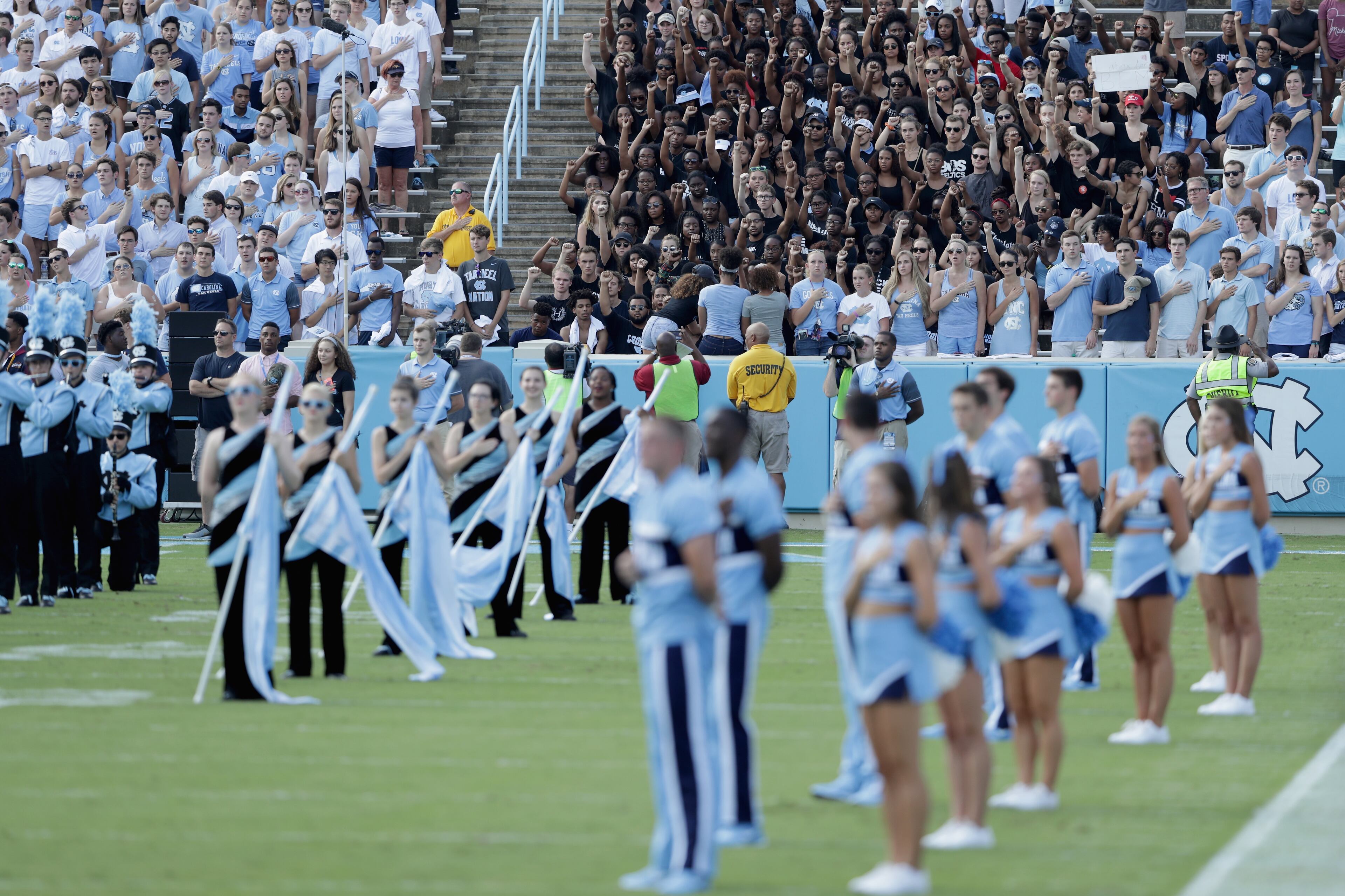 CHAPEL HILL, NC - SEPTEMBER 24: Students protest during the national anthem before the start of the Pittsburgh Panthers and North Carolina Tar Heels game at Kenan Stadium on September 24, 2016 in Chapel Hill, North Carolina. (Photo by Streeter Lecka/Getty Images)