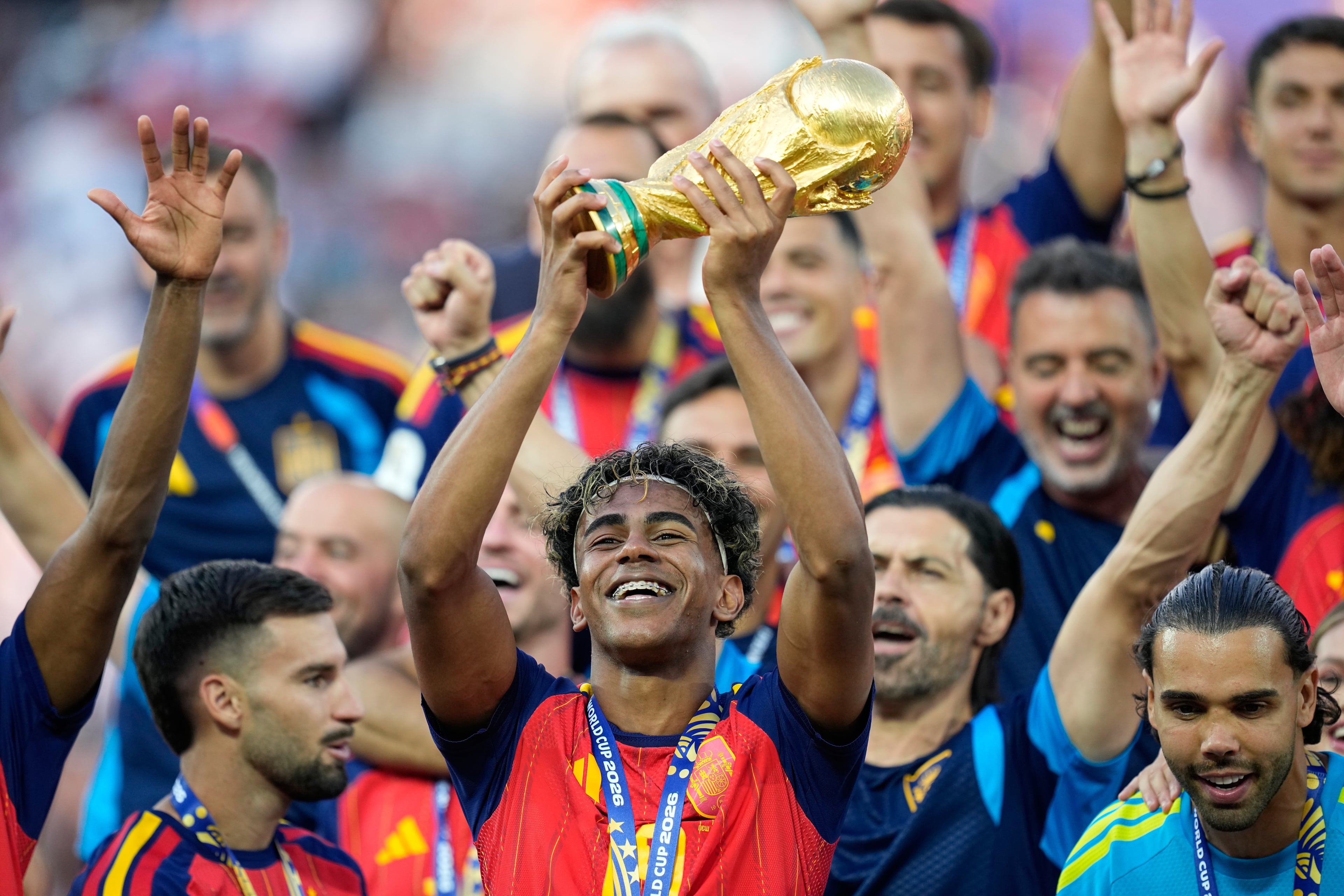 Spain's Lamine Yamal celebrates with the trophy after winning the World Cup final soccer match between Spain and Argentina in East Rutherford, N.J., near New York, Sunday, July 19, 2026. (Ashley Landis/AP)