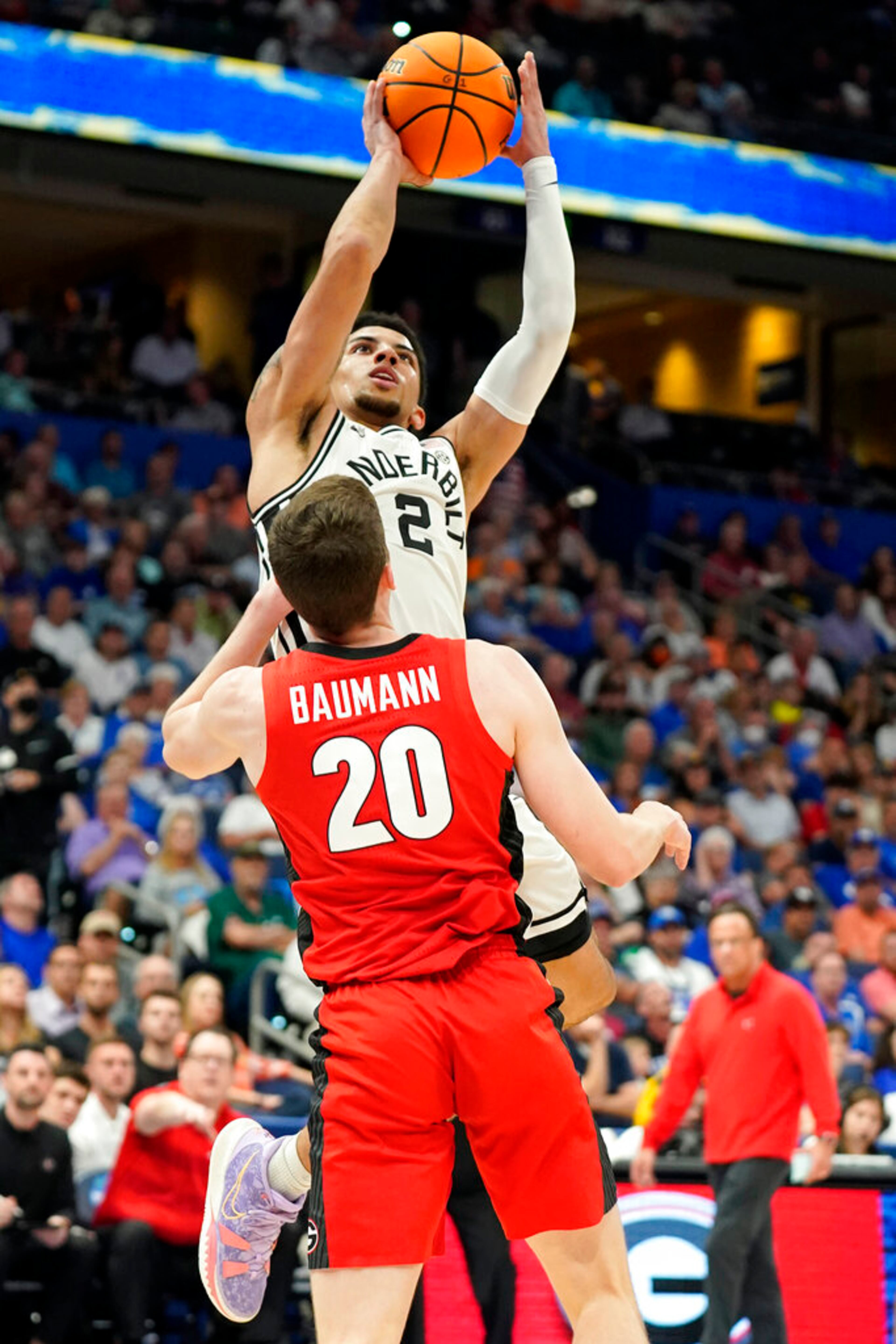 Vanderbilt guard Scotty Pippen Jr. (2) shoots over Georgia guard Noah Baumann (20) during the first half of an NCAA college basketball game in the Southeastern Conference men's tournament Wednesday, March 9, 2022, in Tampa, Fla. (AP Photo/Chris O'Meara)