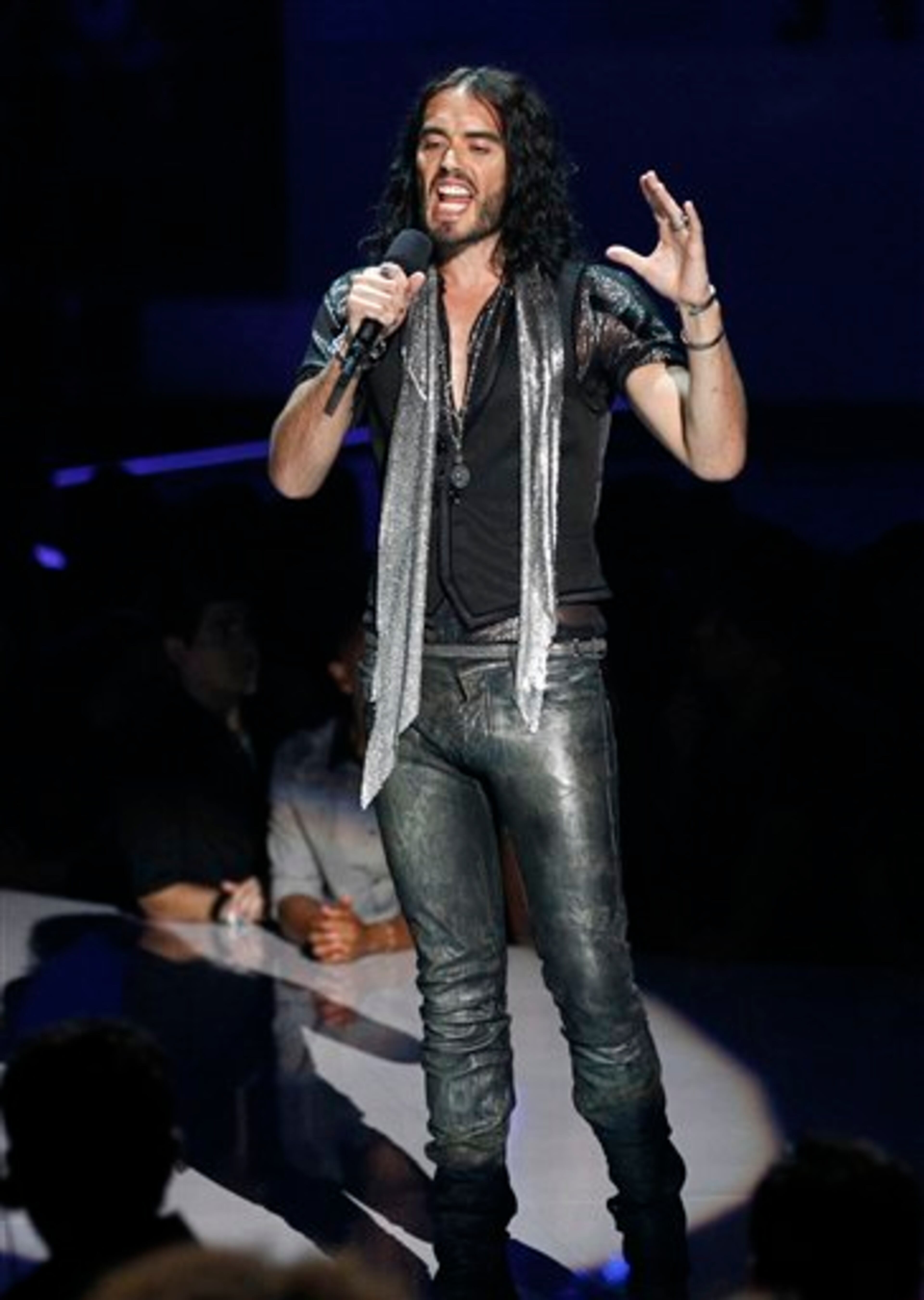 Russell Brand is seen on stage during a tribute for Amy Winehouse at the MTV Video Music Awards on Sunday Aug. 28, 2011, in Los Angeles. (AP Photo/Matt Sayles)