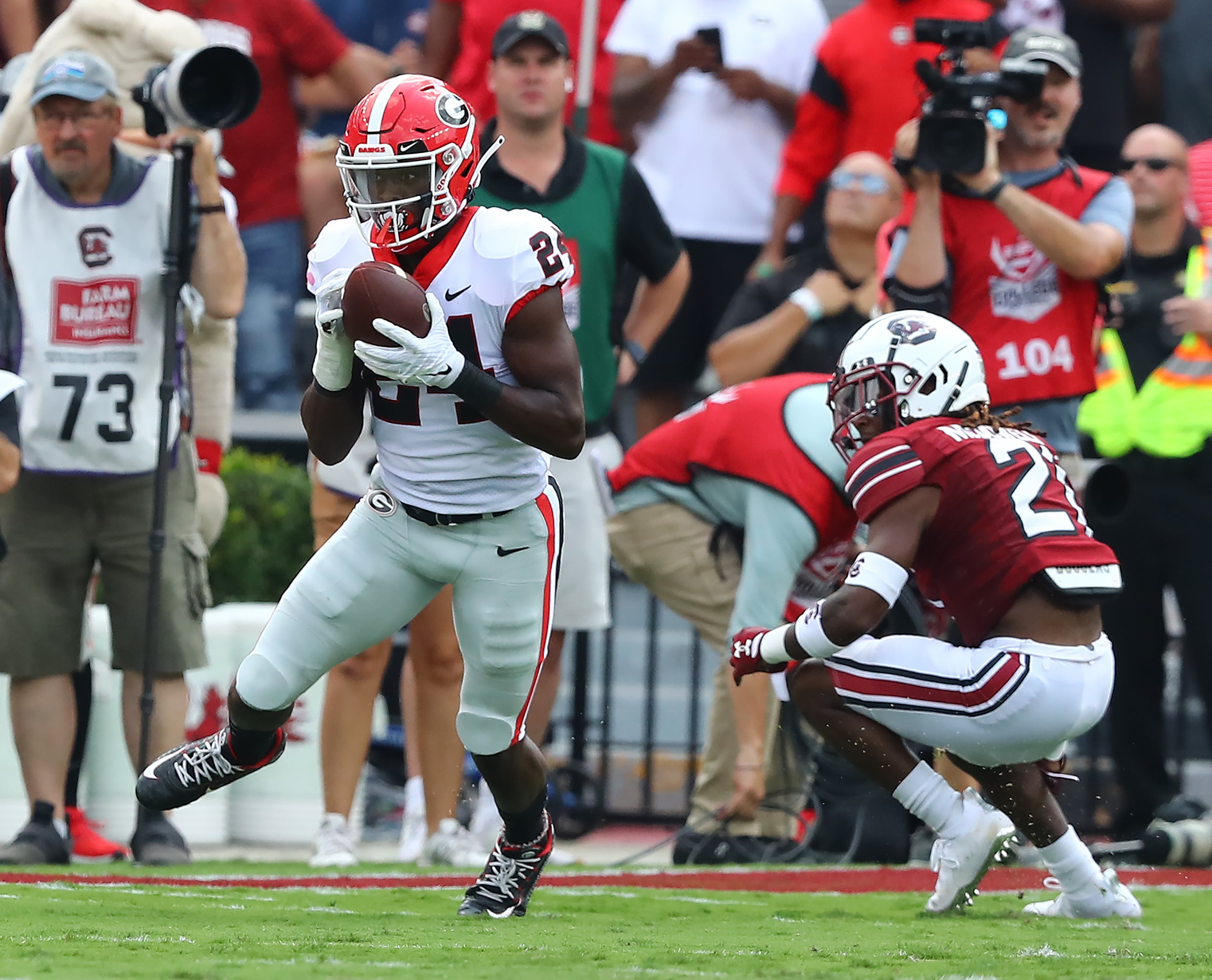 Georgia defensive back Malaki Starks intercepts a pass intended for South Carolina running back Juju McDowell leading to a Georgia scoring drive during the first quarter in a NCAA college football game on Saturday, Sept. 17, 2022, in Columbia. “Curtis Compton / Curtis Compton@ajc.com