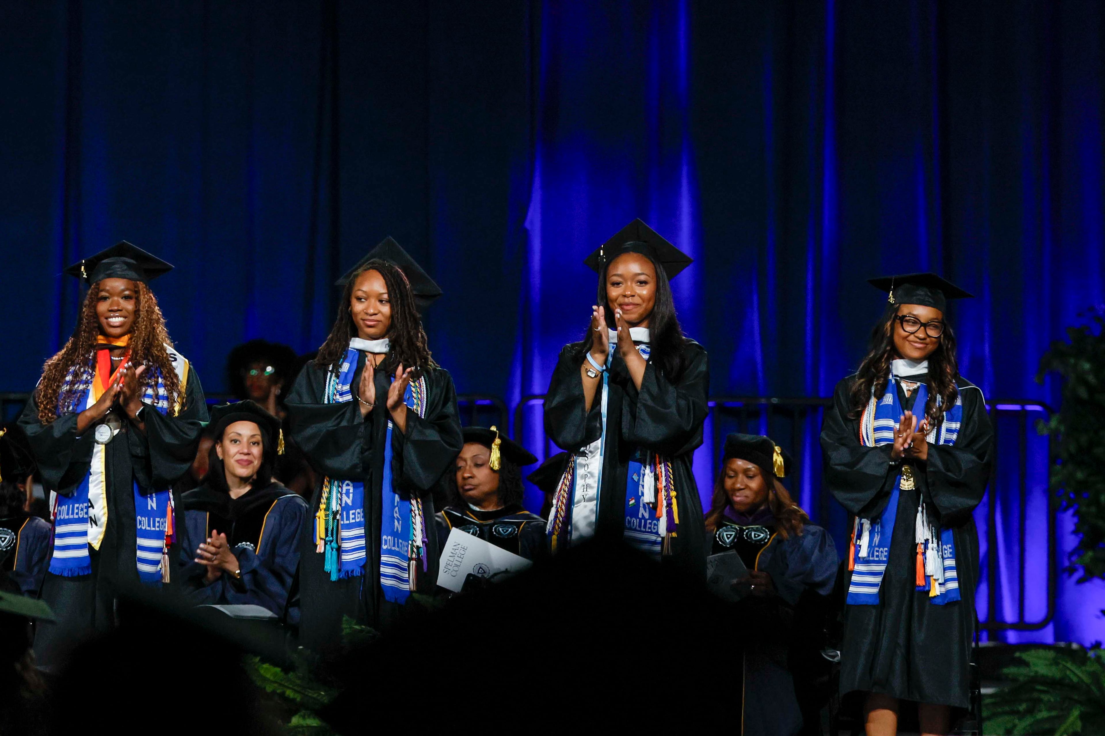 From left to right, Alyssa Chinyere Richardson, Aiyana Elise Ringo, Alexis Renae Sims, and Cori'Anna Kayln White are part of the historic group of seven valedictorians recognized during the Spelman College Commencement at the Georgia International Convention Center in College Park on Sunday, May 17, 2026.
(Miguel Martinez/AJC)