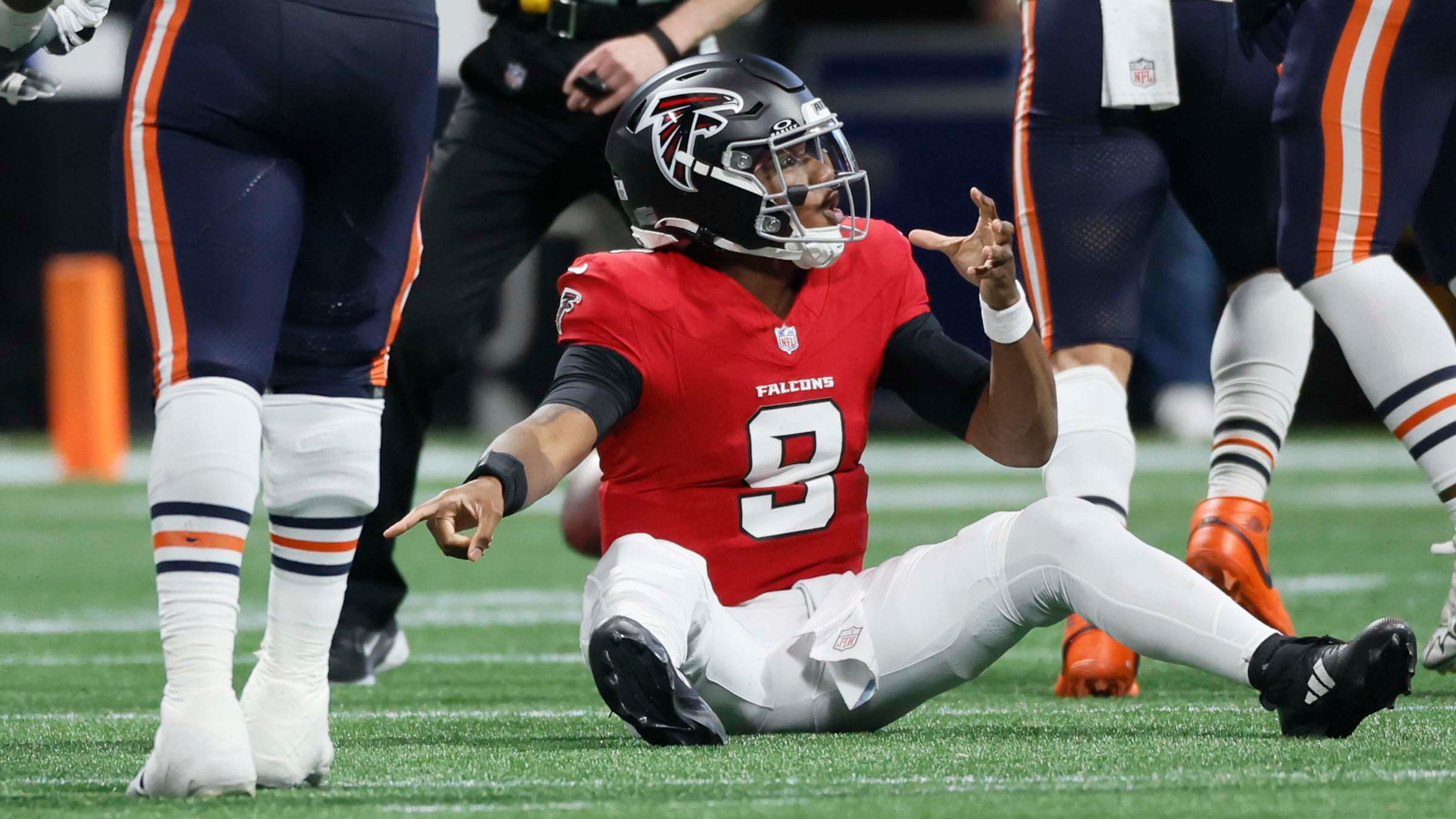 Atlanta Falcons quarterback Michael Penix Jr. argues a call in the second half of an NFL game against the Chicago Bears at Mercedes-Benz Stadium in Atlanta, GA, on Sunday, Oct. 18, 2026. (Miguel Martinez/AJC)