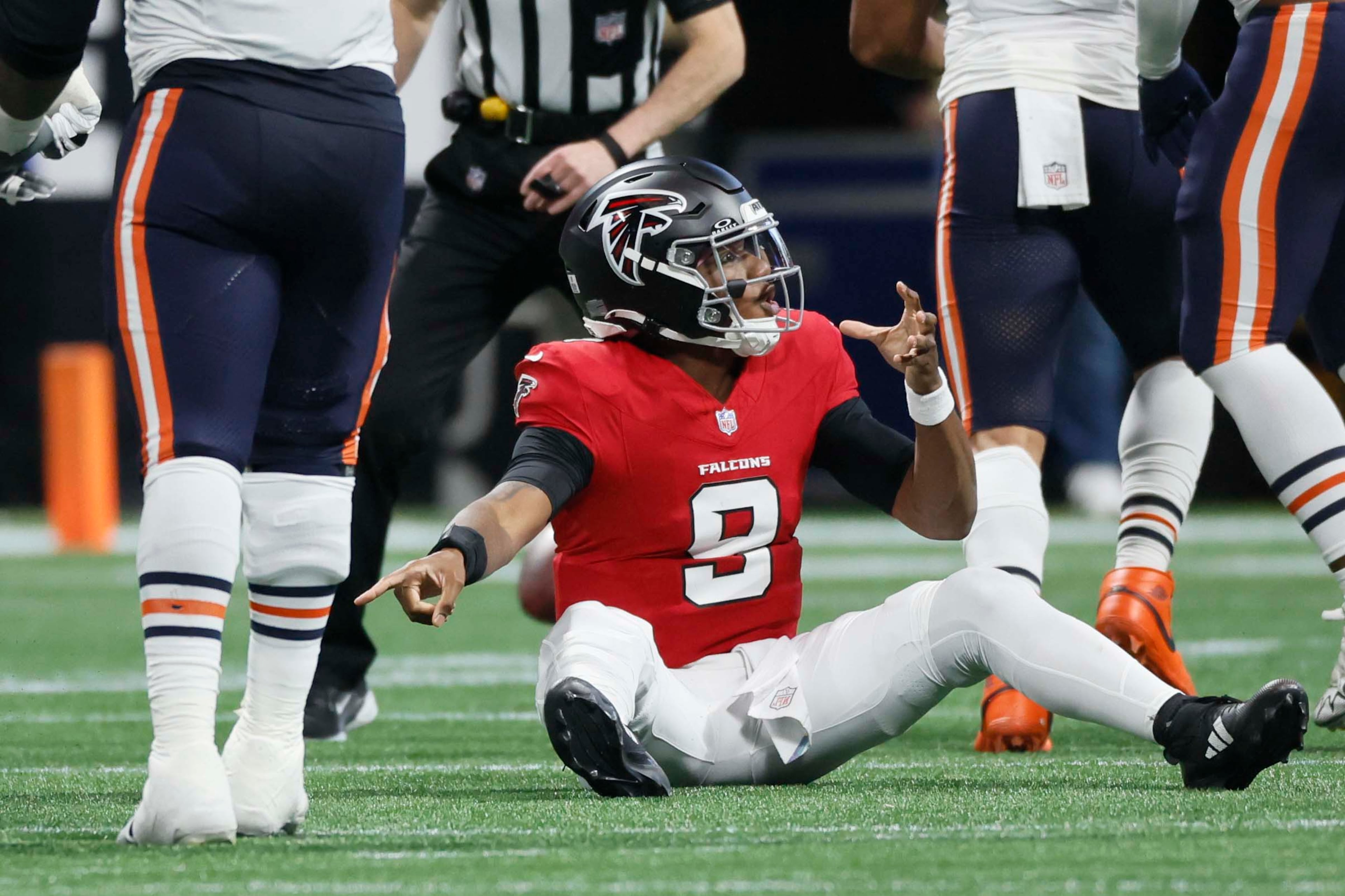 Atlanta Falcons quarterback Michael Penix Jr. argues a call in the second half of an NFL game against the Chicago Bears at Mercedes-Benz Stadium in Atlanta on Sunday, Oct. 18, 2026. (Miguel Martinez/AJC)