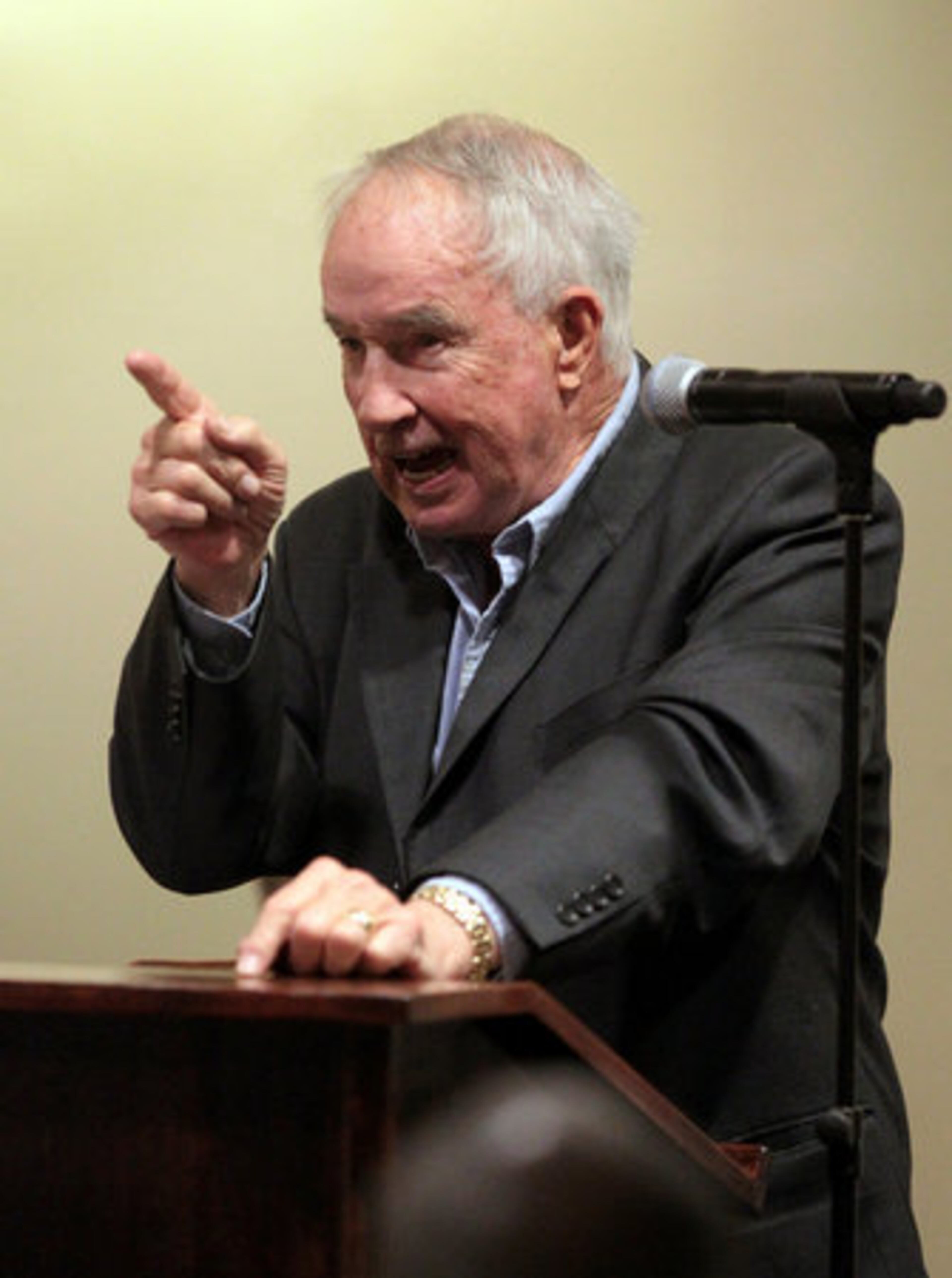 Former Georgia Tech coach Pepper Rodgers tells a story about the late Drew Hill during a memorial service at Bobby Dodd Stadium Friday afternoon in Atlanta, Ga., March 25, 2011. Hill, a former standout at Georgia Tech and in the NFL, died last Friday after suffering two strokes. Rodgers coached Hill when he was at Tech from 1974-79.