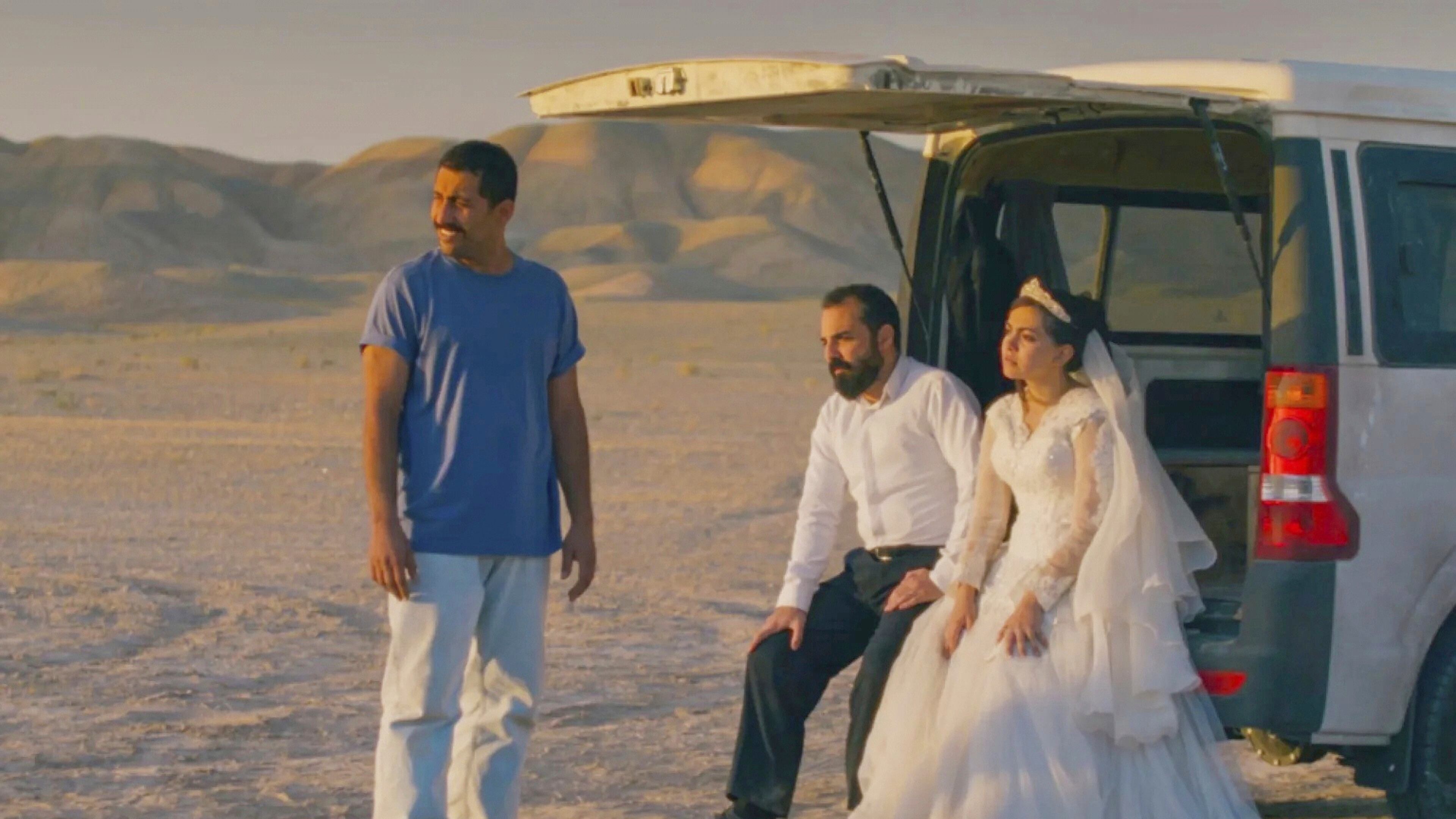 This image released by Neon shows, from left, Mohamad Ali Elyasmehr as Hamid, Majid Panahi as Ali, Hadis Pakbaten as Goli, in a scene from "It Was Just an Accident." (Neon via AP)