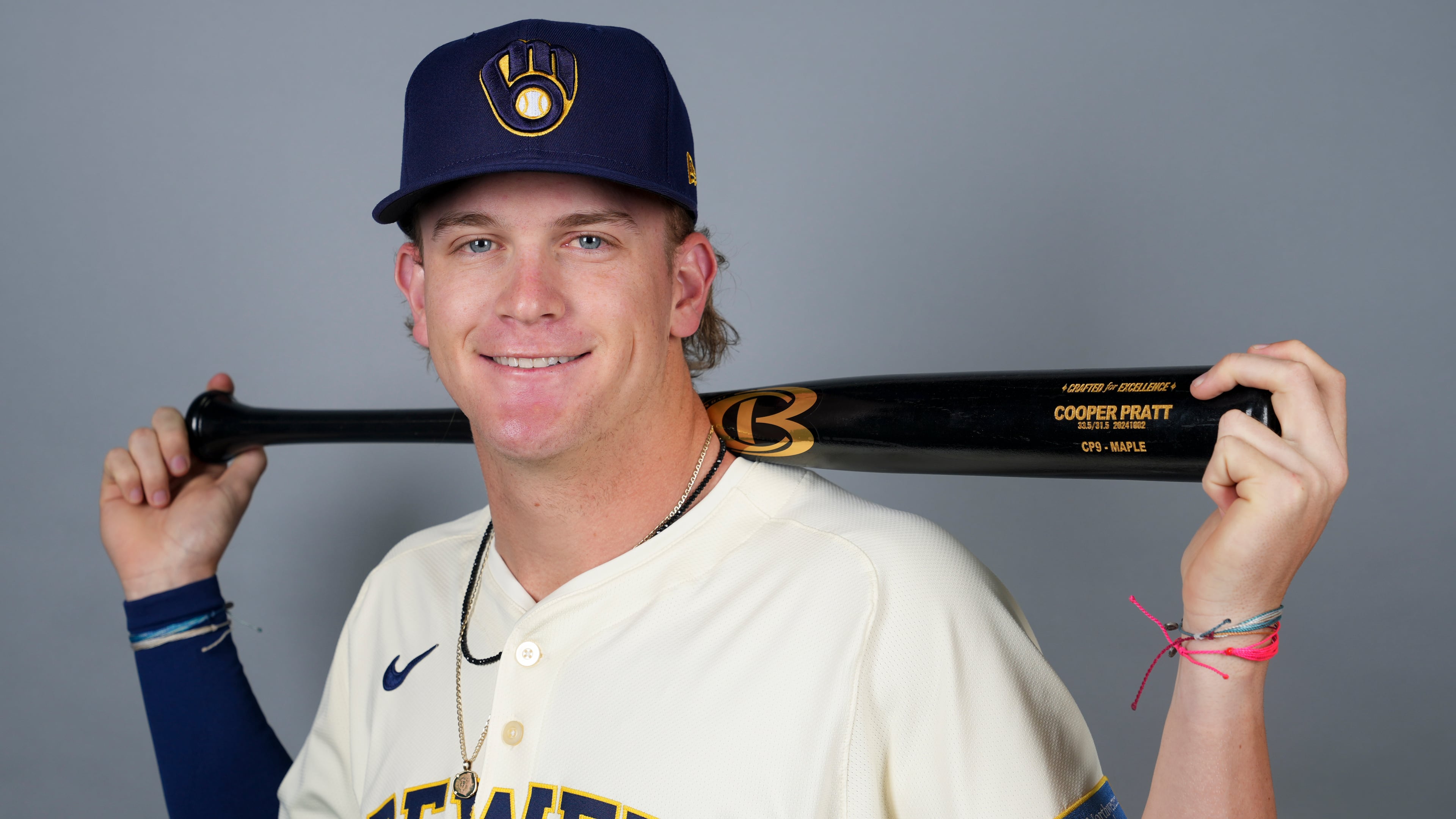 FILE - Milwaukee Brewers infielder Cooper Pratt poses for an official photo, Feb. 21, 2025. (AP Photo/Lindsey Wasson, File)