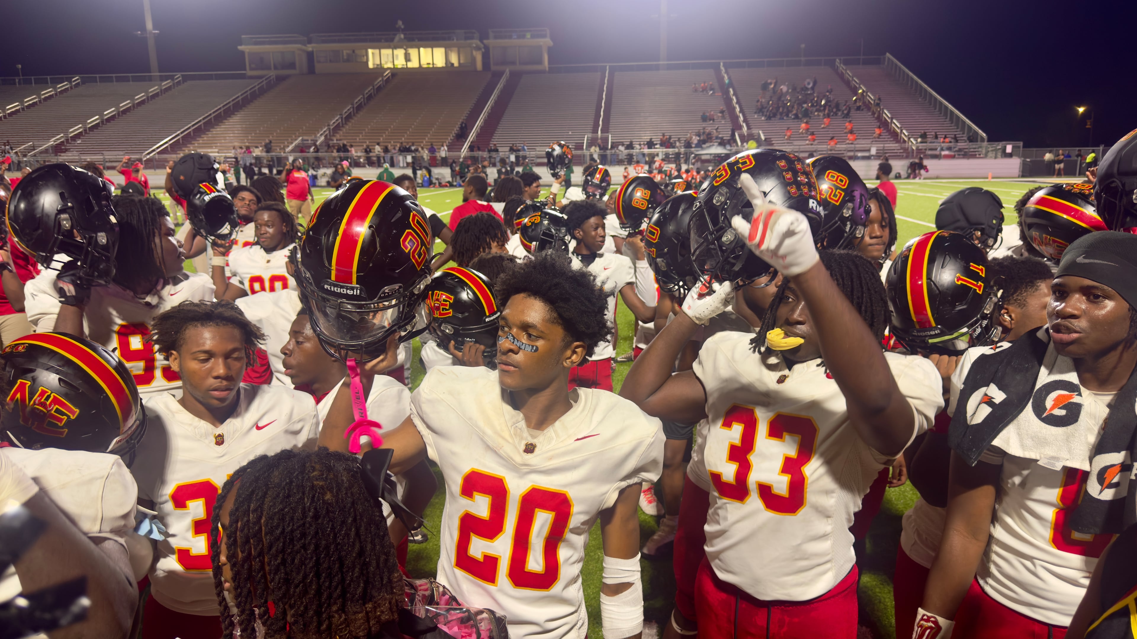 Members of Macon's Northeast High School Raiders celebrate their win over Bibb County foe Rutland High School on Thursday, Oct. 1, 2026, at Ed DeFore Sports Complex. (Joe Kovac Jr./AJC)