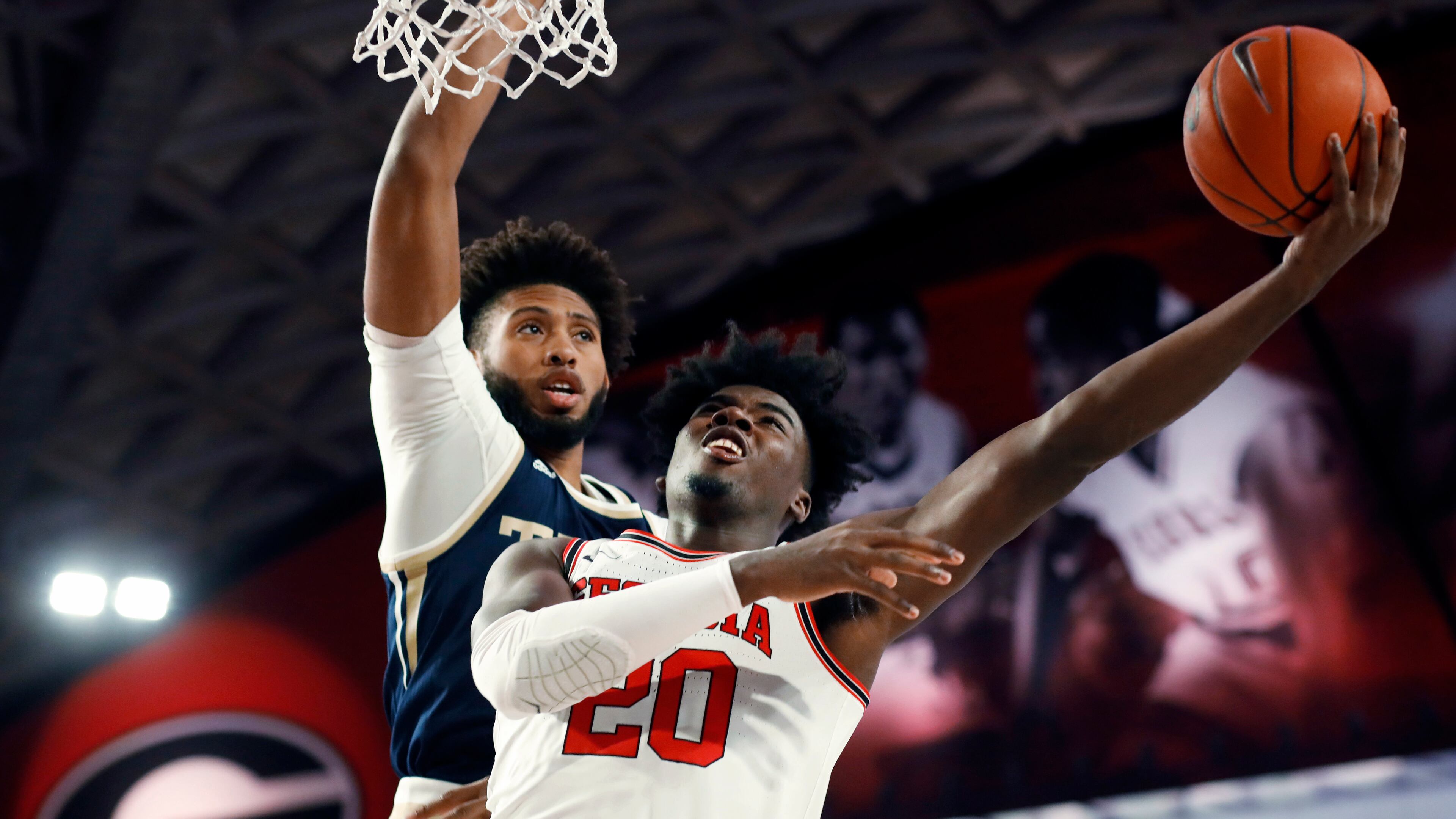 Georgia's Rayshaun Hammonds (20) shoots as Georgia Tech forward James Banks III defends. (Joshua L. Jones/Athens Banner-Herald via AP)