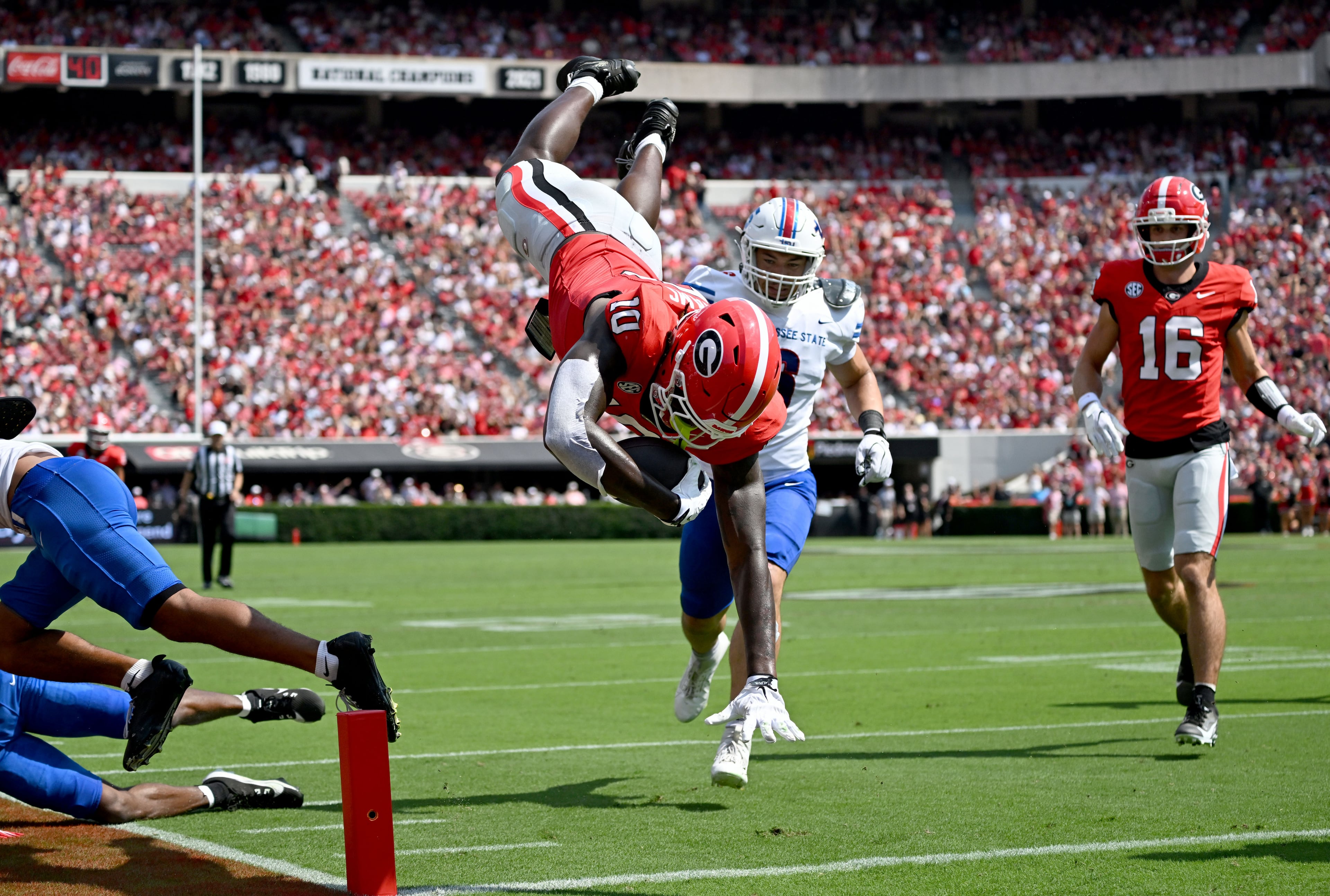 Georgia tight end Elyiss Williams dives into the end zone for a touchdown during the first half in an NCAA football game vs. Tennessee State at Sanford Stadium on Saturday, Sept. 5, 2026, in Athens, Ga. (Hyosub Shin/AJC)