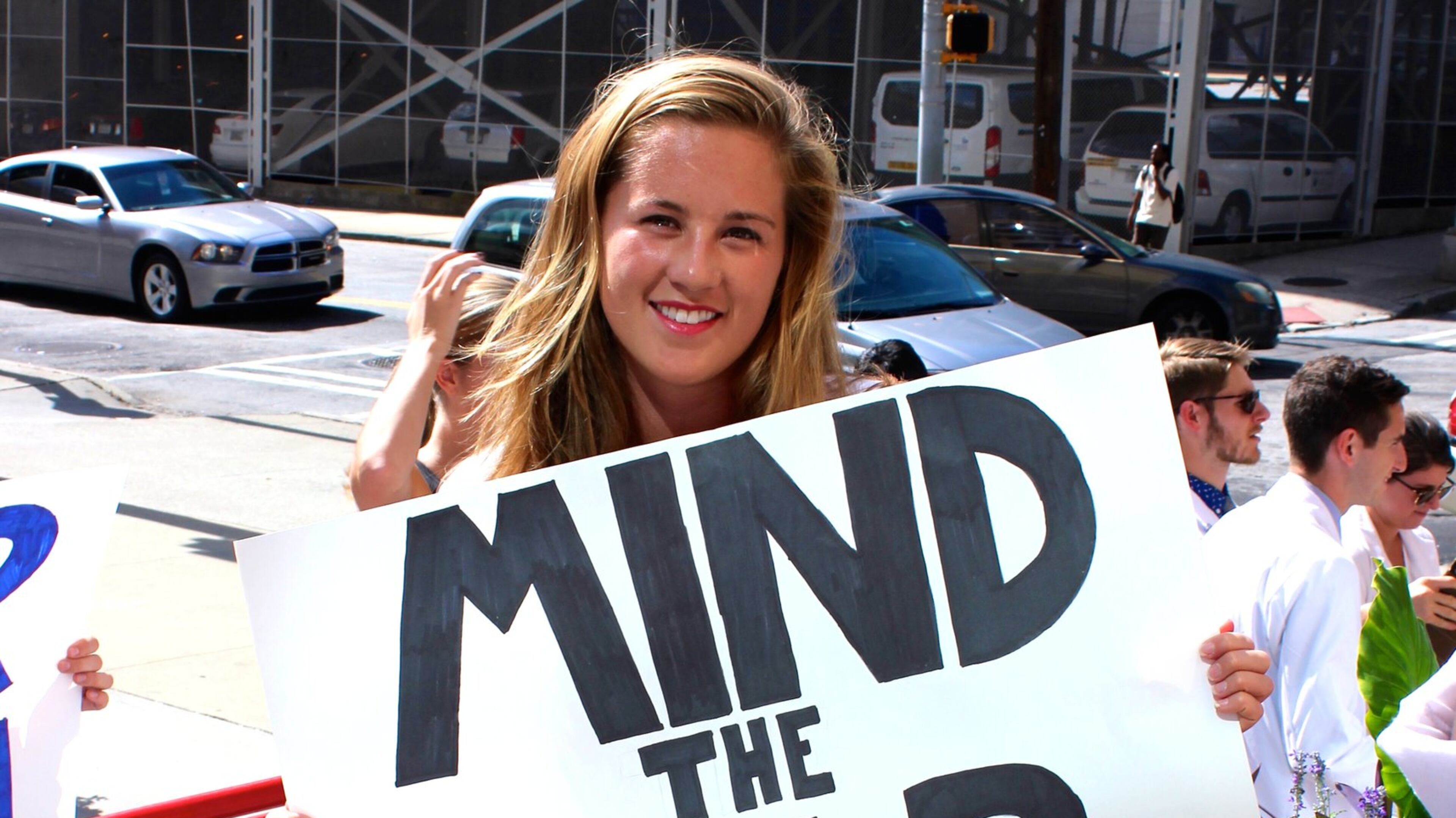 Emory medical student Alex Ernst participates last month at a rally of Health Students Taking Action Together to close the health insurance gap. CLARA LEE