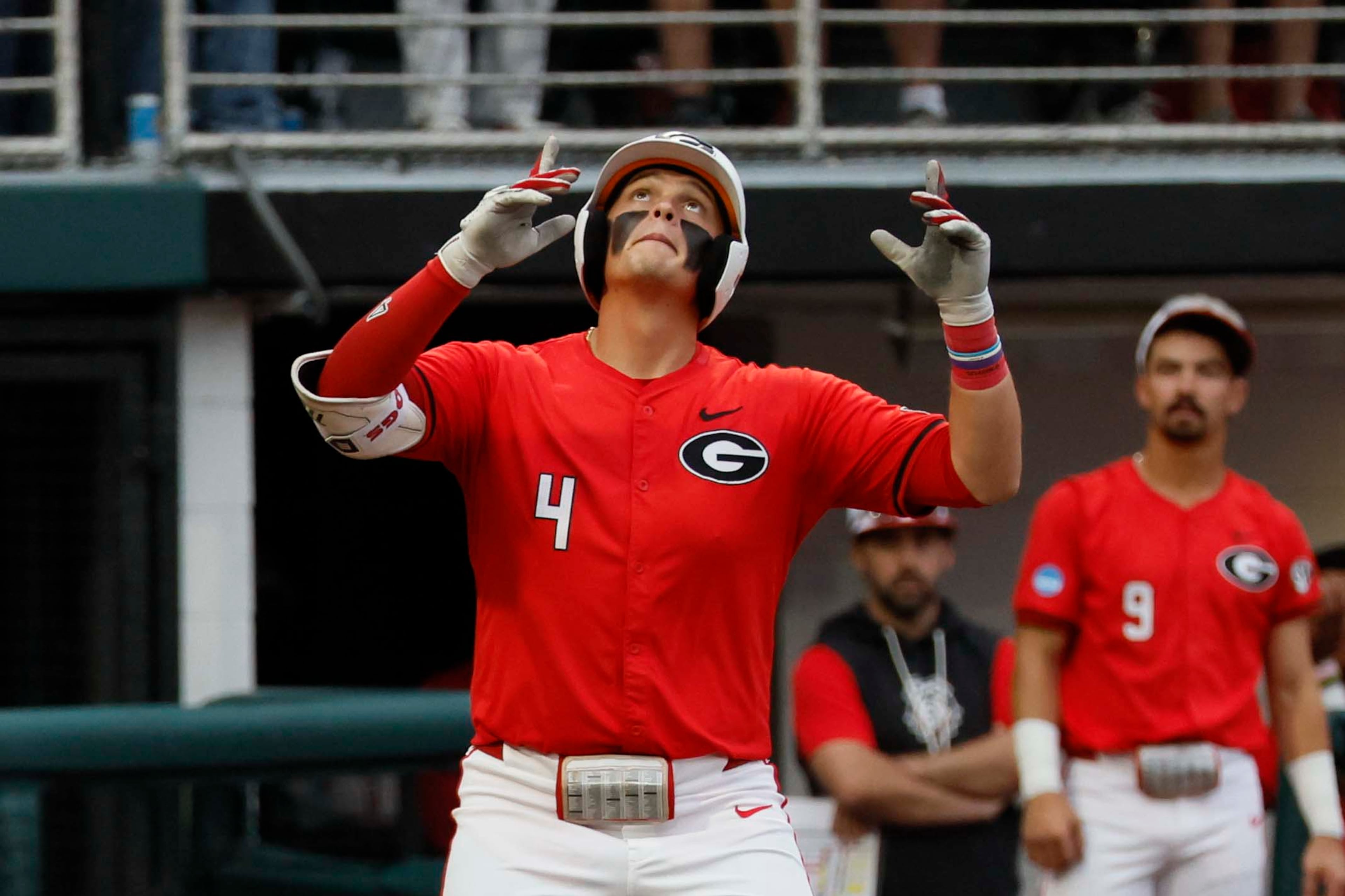 Georgia Bulldogs infielder Michael O’Shaughnessy (4) reacts at home plate after his solo home run during the eighth inning of their NCAA Regional final game at Foley Field on Sunday, May 31, 2026, in Athens. (Miguel Martinez/AJC)