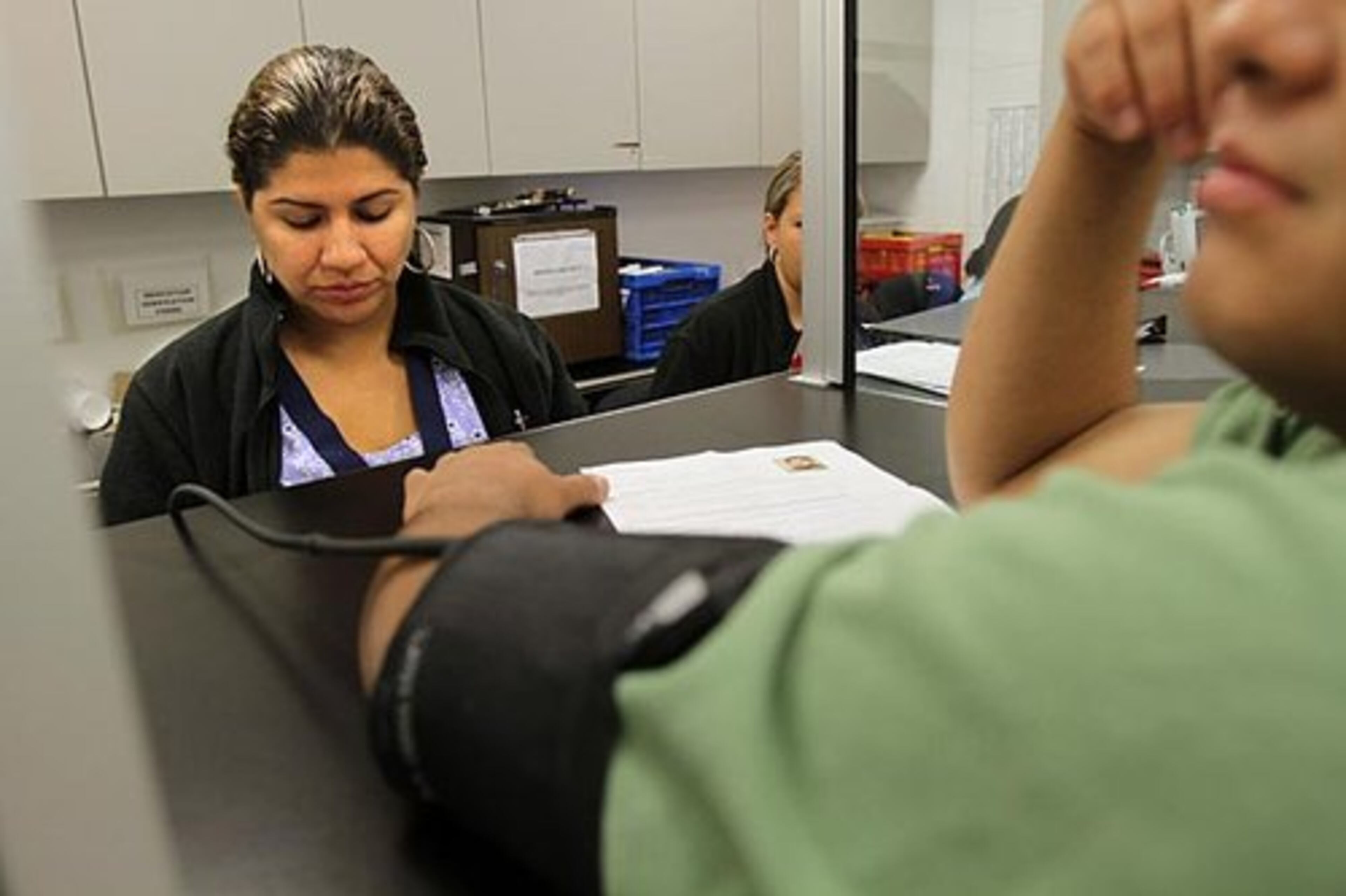 Step 2: A medical examination, here by CMA Paula Jaramillo.