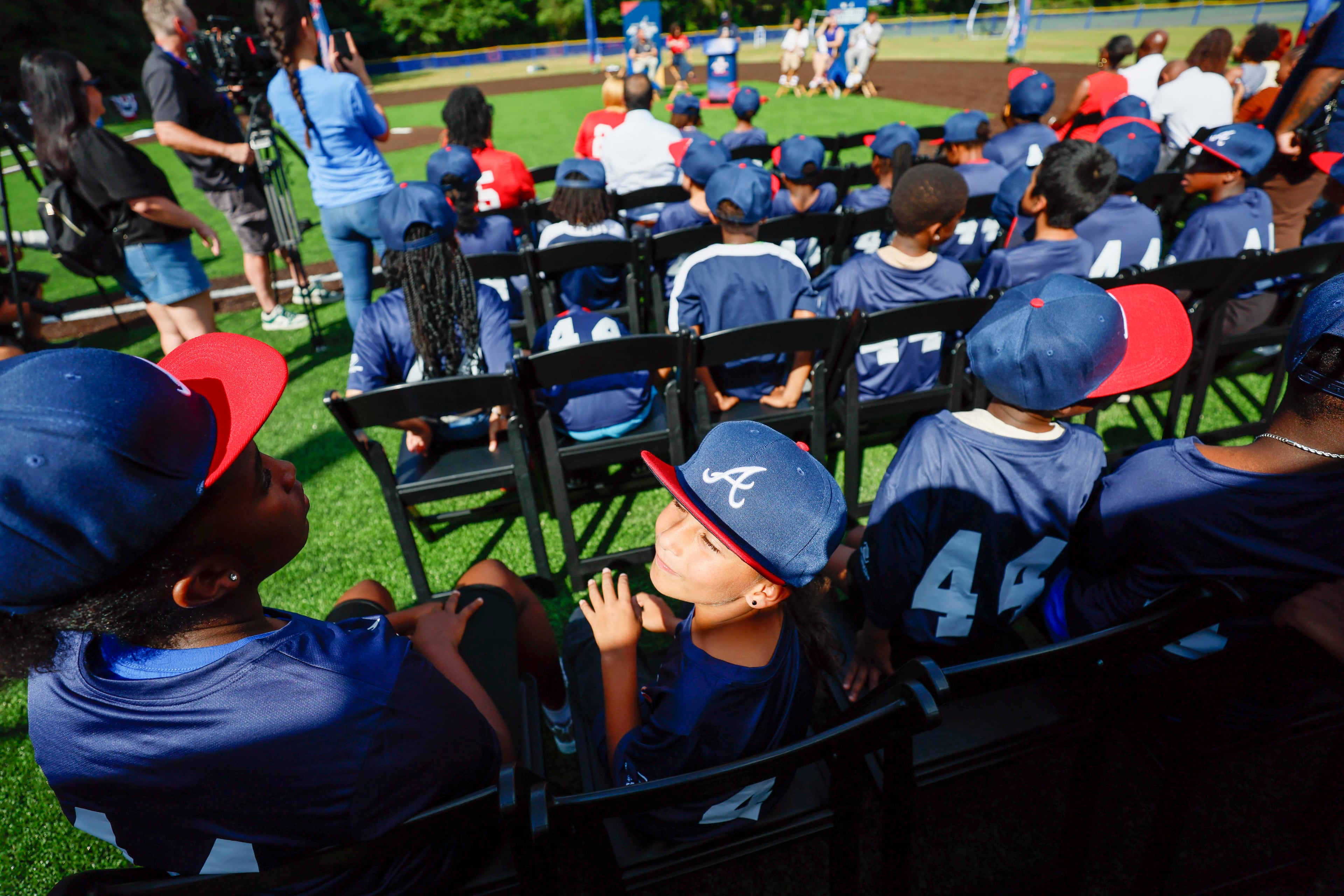 Kids are seen participating in the unveiling of the new All-Star Legacy Field at the Barksdale Boys & Girls Club in Conyers on Thursday, July 10, 2025. The event takes place during MLB All-Star Game week in Atlanta.
(Miguel Martinez/ AJC)