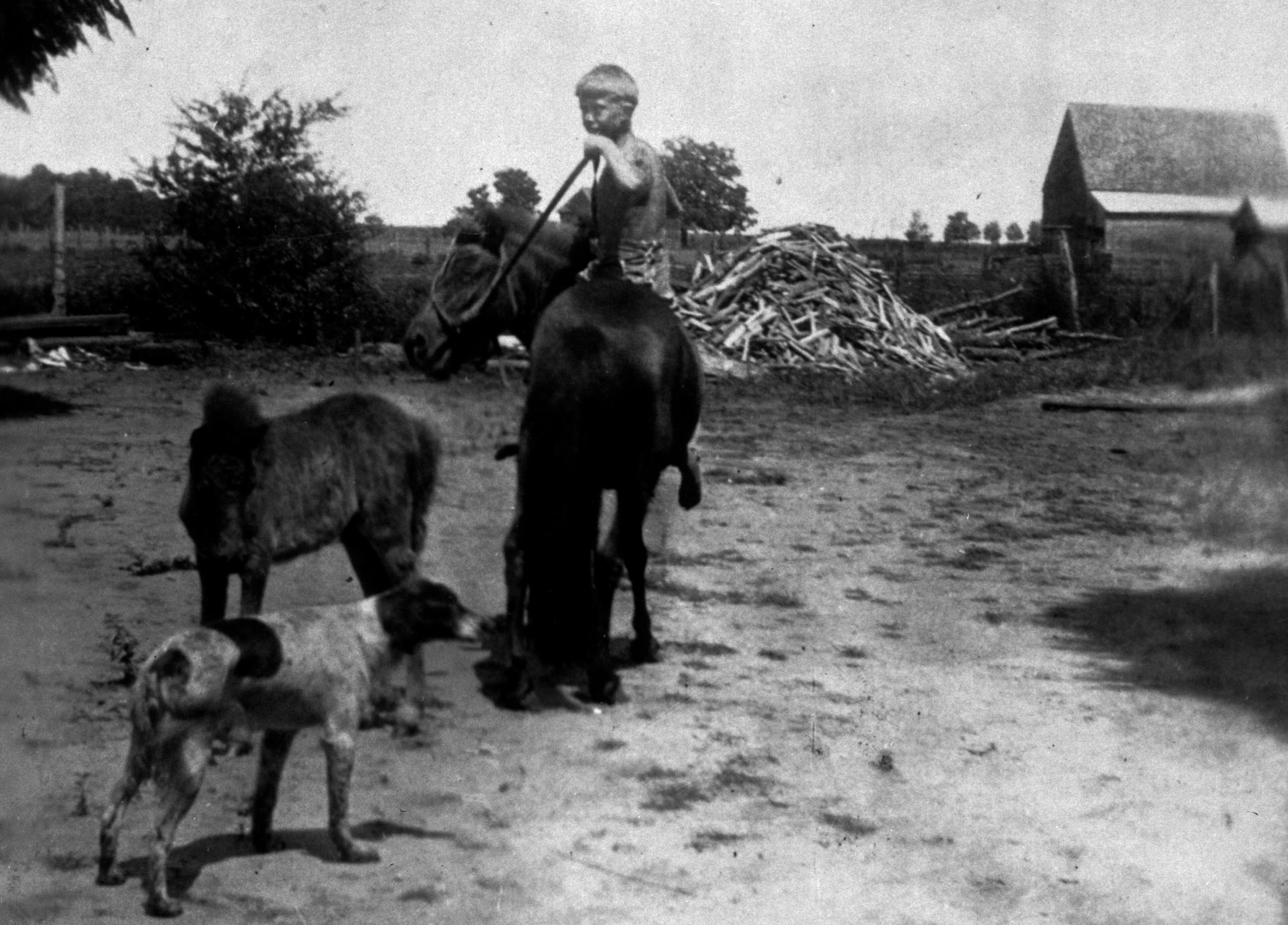 In 1928, the Carter family moved to a 350-acre farm near Plains in the tiny community of Archery, Ga. Jimmy Carter is pictured here atop his Shetland pony named Lady. (Jimmy Carter Library)