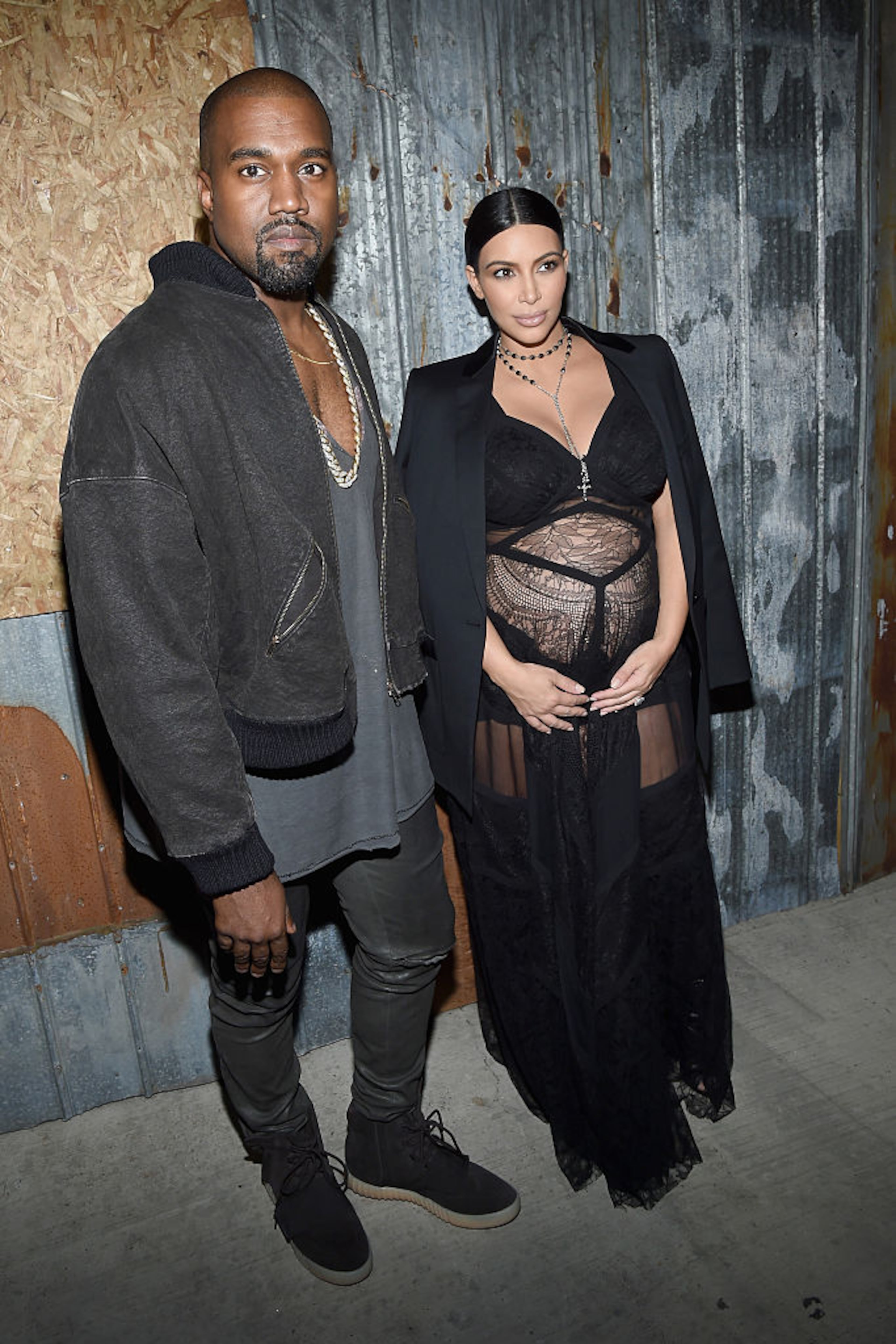 NEW YORK, NY - SEPTEMBER 11: Rapper Kanye West (L) and television personality Kim Kardashian attend the Givenchy fashion show during Spring 2016 New York Fashion Week at Pier 26 at Hudson River Park on September 11, 2015 in New York City. (Photo by Larry Busacca/Getty Images)