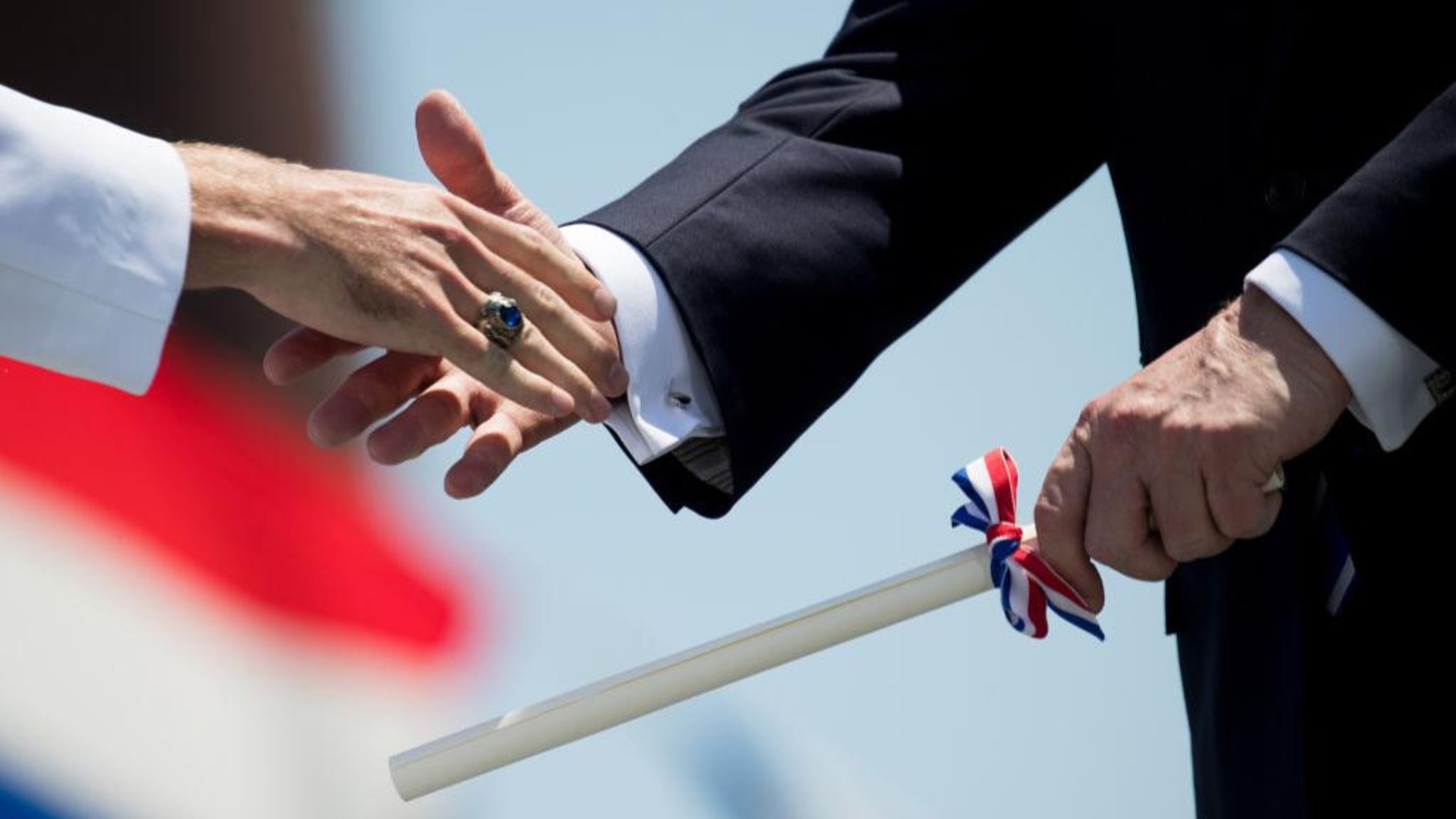 A woman in Texas received an emotionally charged graduation photo from her husband.