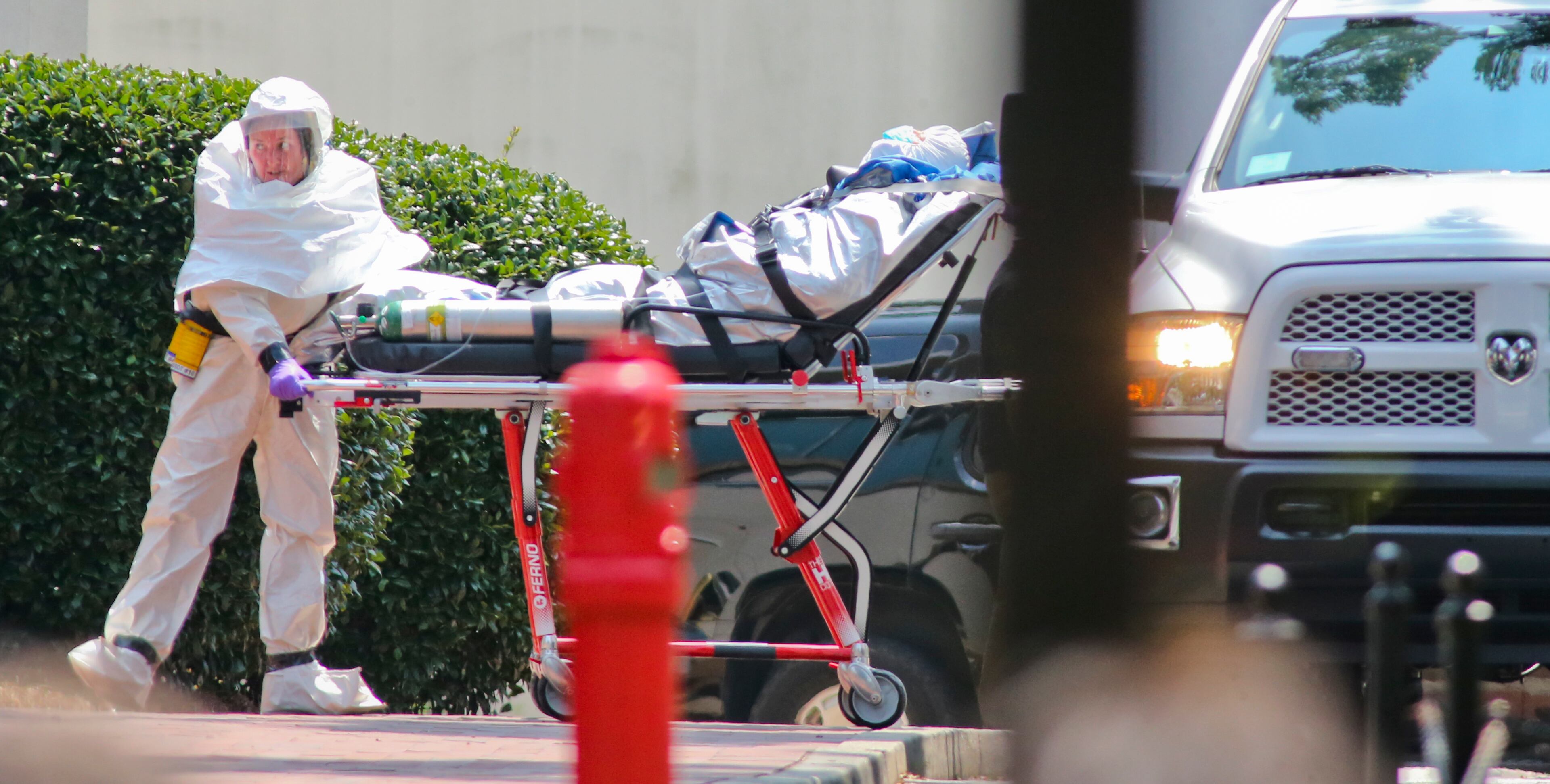 Medical workers roll patient Nancy Writebol into Emory Hospital. The second American aid worker infected with Ebola arrived Tuesday, Aug. 5, 2014 in Atlanta. Nancy Writebol arrived in a chartered jet at Dobbins Air Reserve Base and was then taken in an ambulance to Emory University Hospital. She was taken from the ambulance by gurney and rolled into the hospital by suited medical personnel. Three days earlier, Dr. Kent Brantly, also diagnosed with the virus, arrived at Emory walked from the ambulance. The two patients are being treated in an isolation unit. MANDATORY CREDIT / JOHN SPINK/JSPINK@AJC.COM