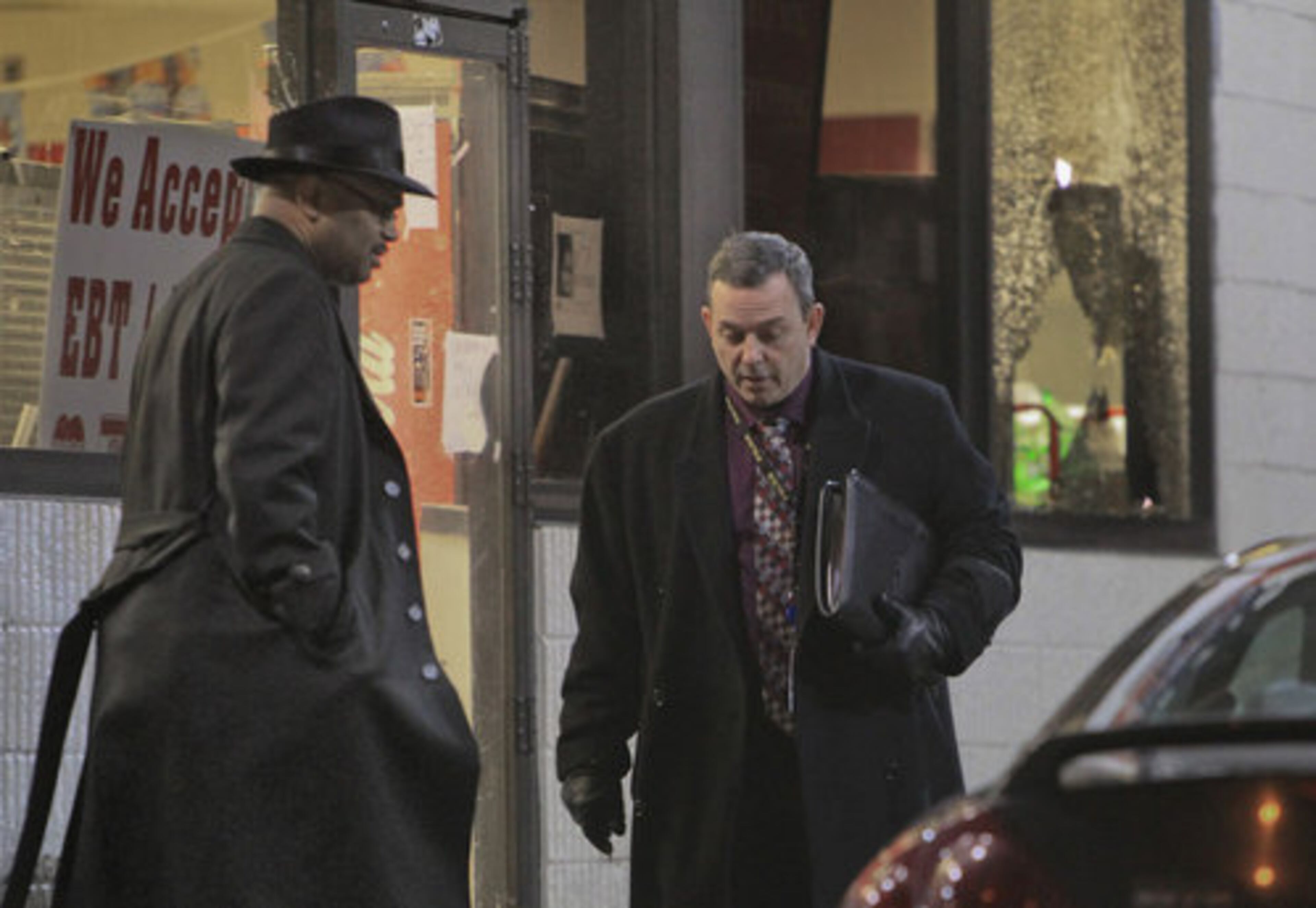 Police were interviewing two witnesses early Thursday and were reviewing security video from the store. Atlanta police Major Keith Meadows (left) and Lt. Paul Guerrucci exit the Citgo.