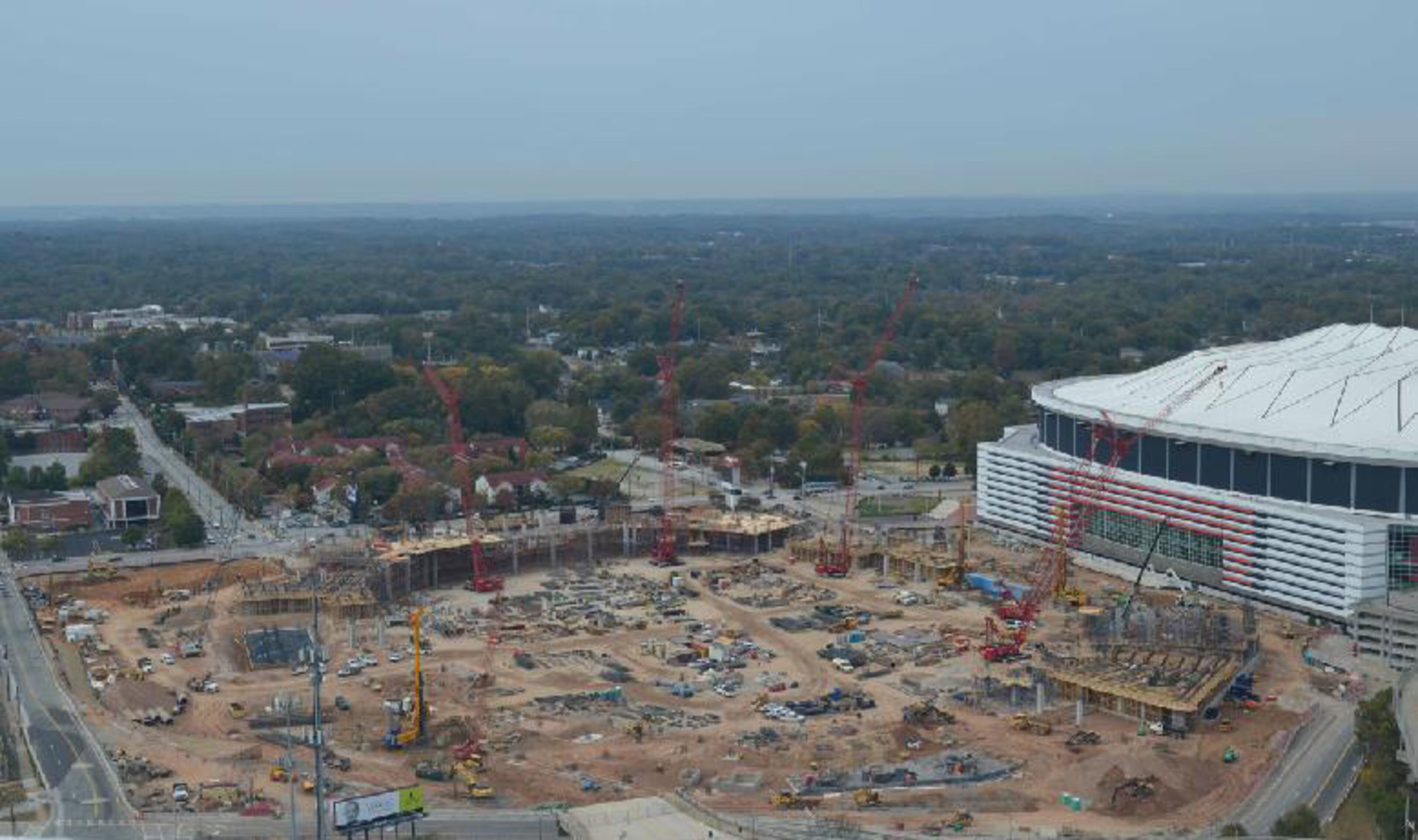 The two main entry plazas to the new Falcons' stadium begin to take shape on the north and south ends as construction progresses into November 2014.
