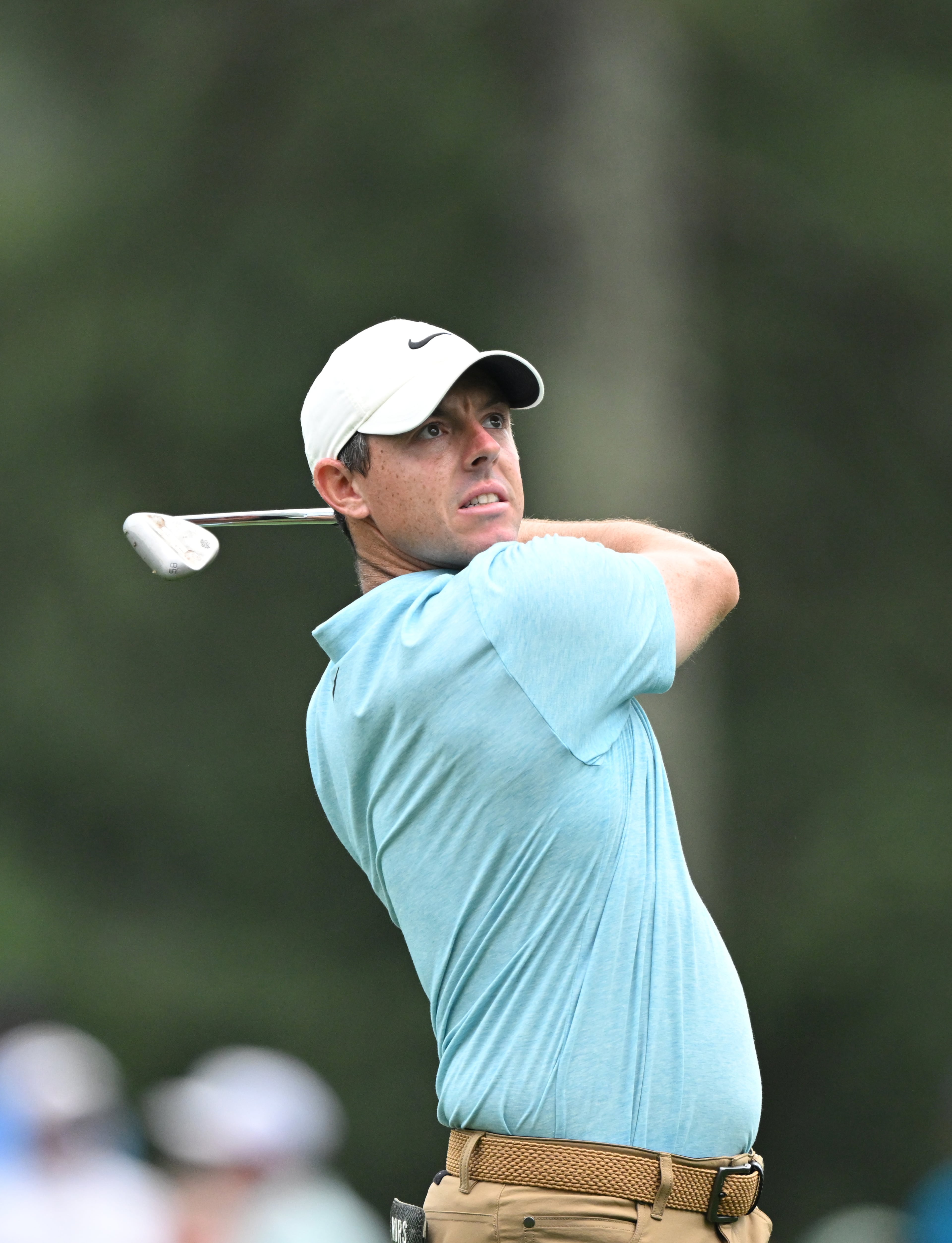 Rory McIlroy hits fairway shot on 15th hole during first round of the 2023 Masters Tournament at Augusta National Golf Club, Thursday, April 6, 2023, in Augusta, Ga. (Hyosub Shin / Hyosub.Shin@ajc.com)