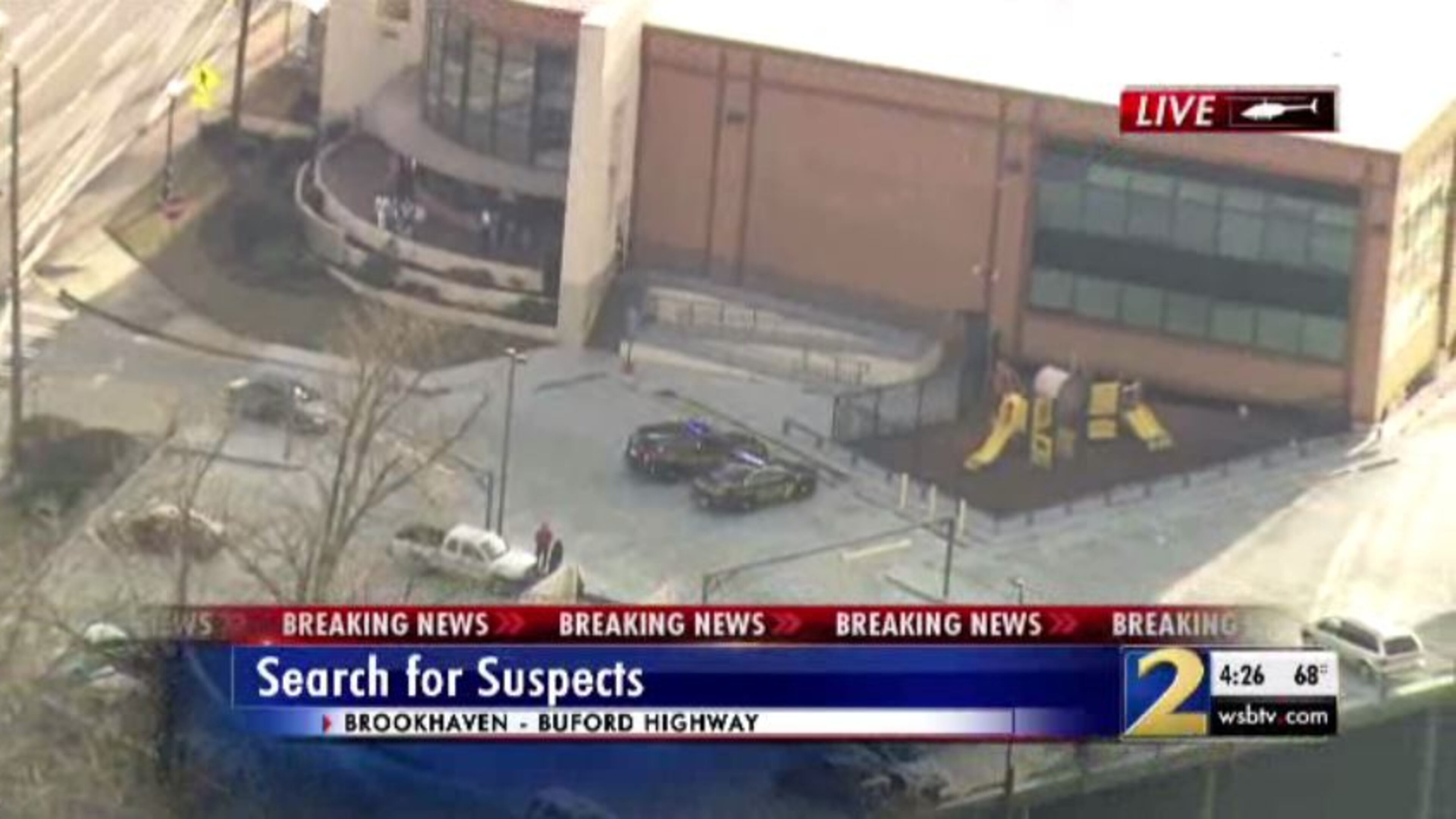 Police said the stolen car crashed into a parked car in the parking lot of the Latin American Association building on Buford Highway.