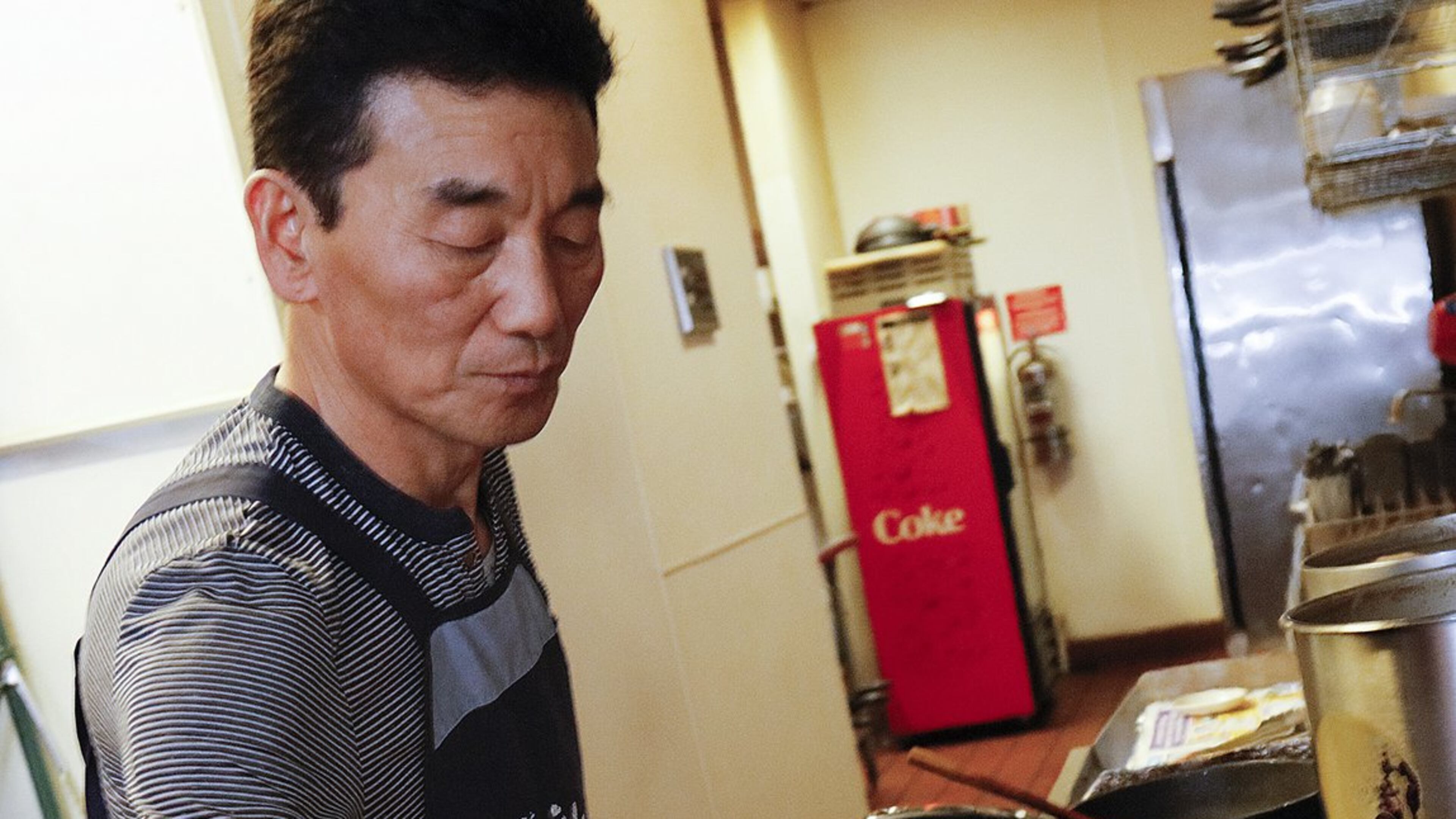 Pong-yun Kim, chef-owner of Kimchi Tofu House in Minneapolis, cooks sundubu through the lunch hour. (Tom Wallace/Minneapolis Star Tribune/TNS)