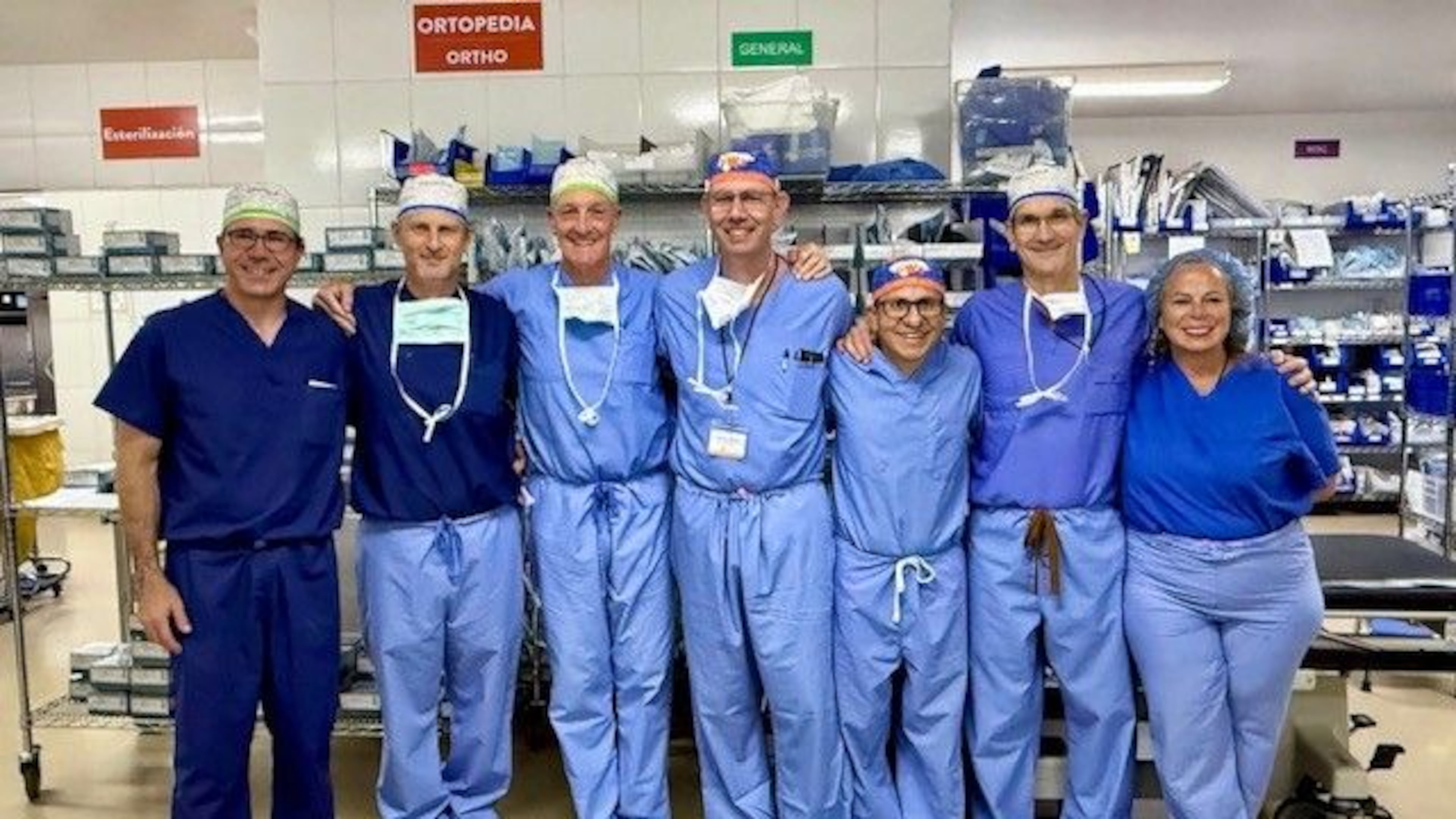 Health care workers, including orthopedic surgeons from Piedmont Clinic, perform knee replacement surgeries at no cost during a mission trip to Honduras. Dr. Stephen Smith (third from left), with Peachtree Orthopedics in Atlanta, coordinates the biannual trips. (Courtesy of Dr. Stephen Smith)