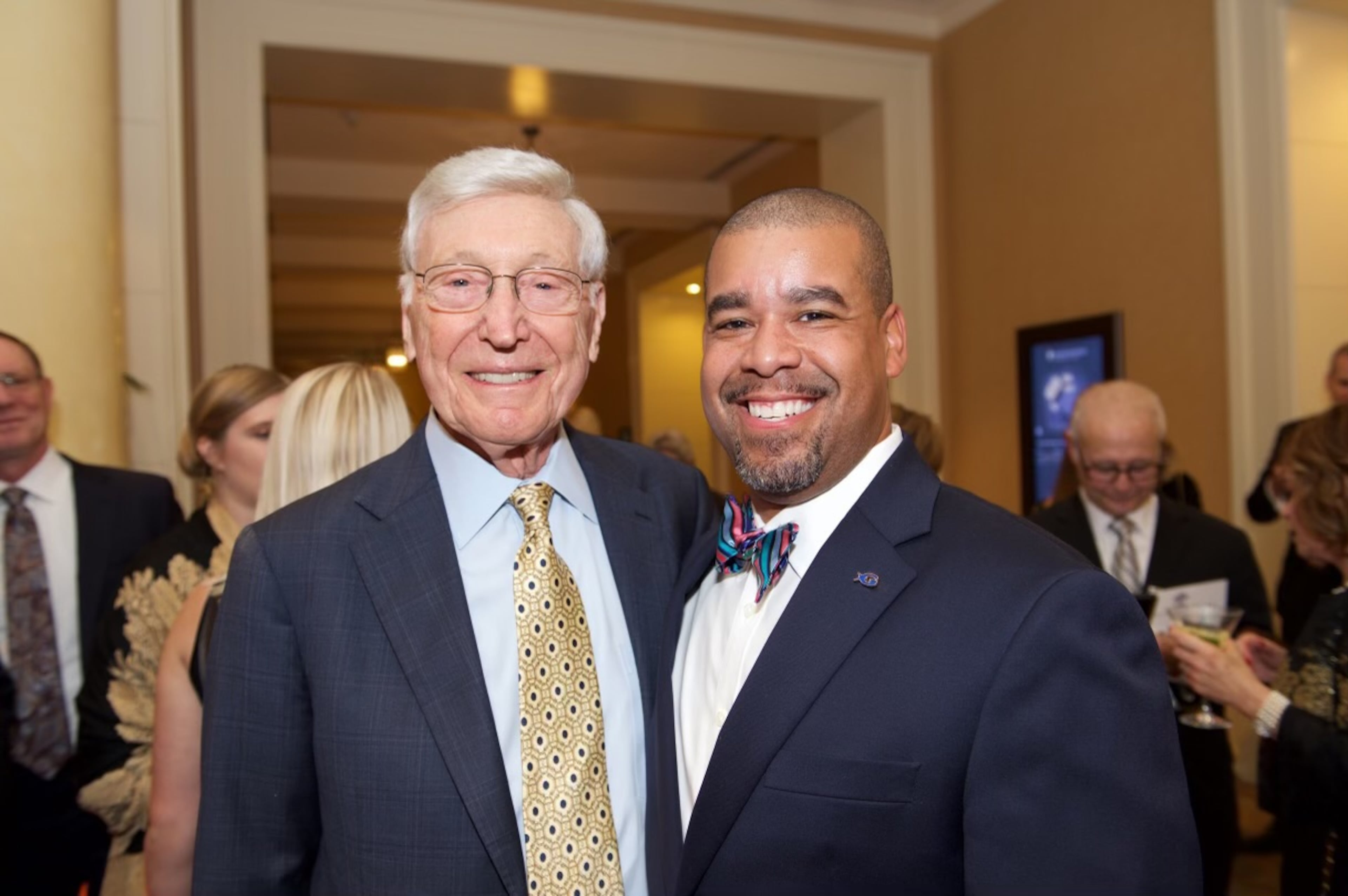 Bernie Marcus, left, hired Joe Handy, right, as part of the founding team for the Georgia Aquarium. Handy would go on to serve as its president and COO.