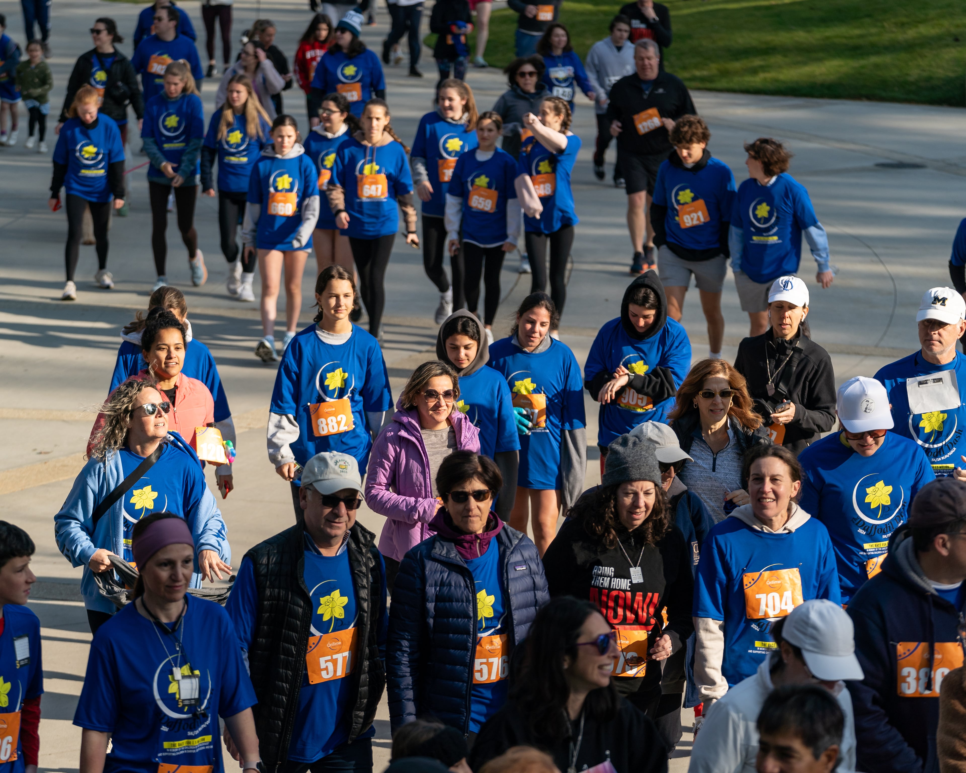 Over 800 people gathered and ran in the Daffodil Dash to honor the lives of the 1.5 million children who died in the Holocaust at Brook Run Park in Dunwoody on Sunday, April 7, 2024. (Ben Hendren for The Atlanta Journal-Constitution)