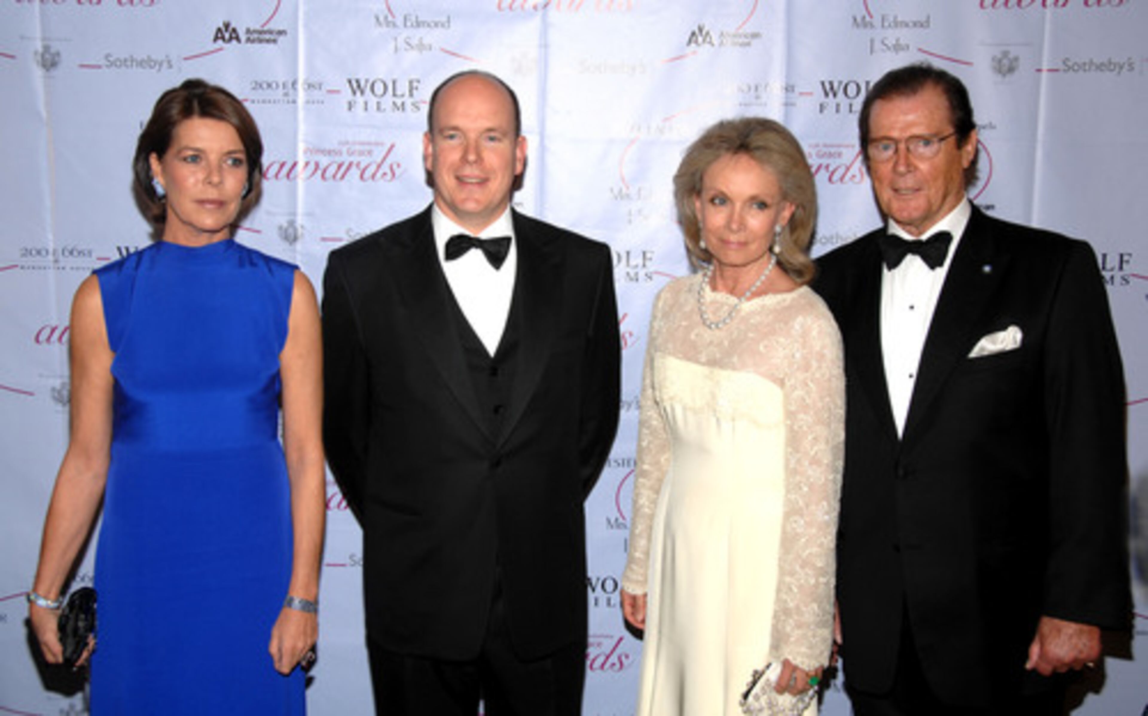 Princess Caroline and Prince Albert join Roger Moore and his wife at the event.