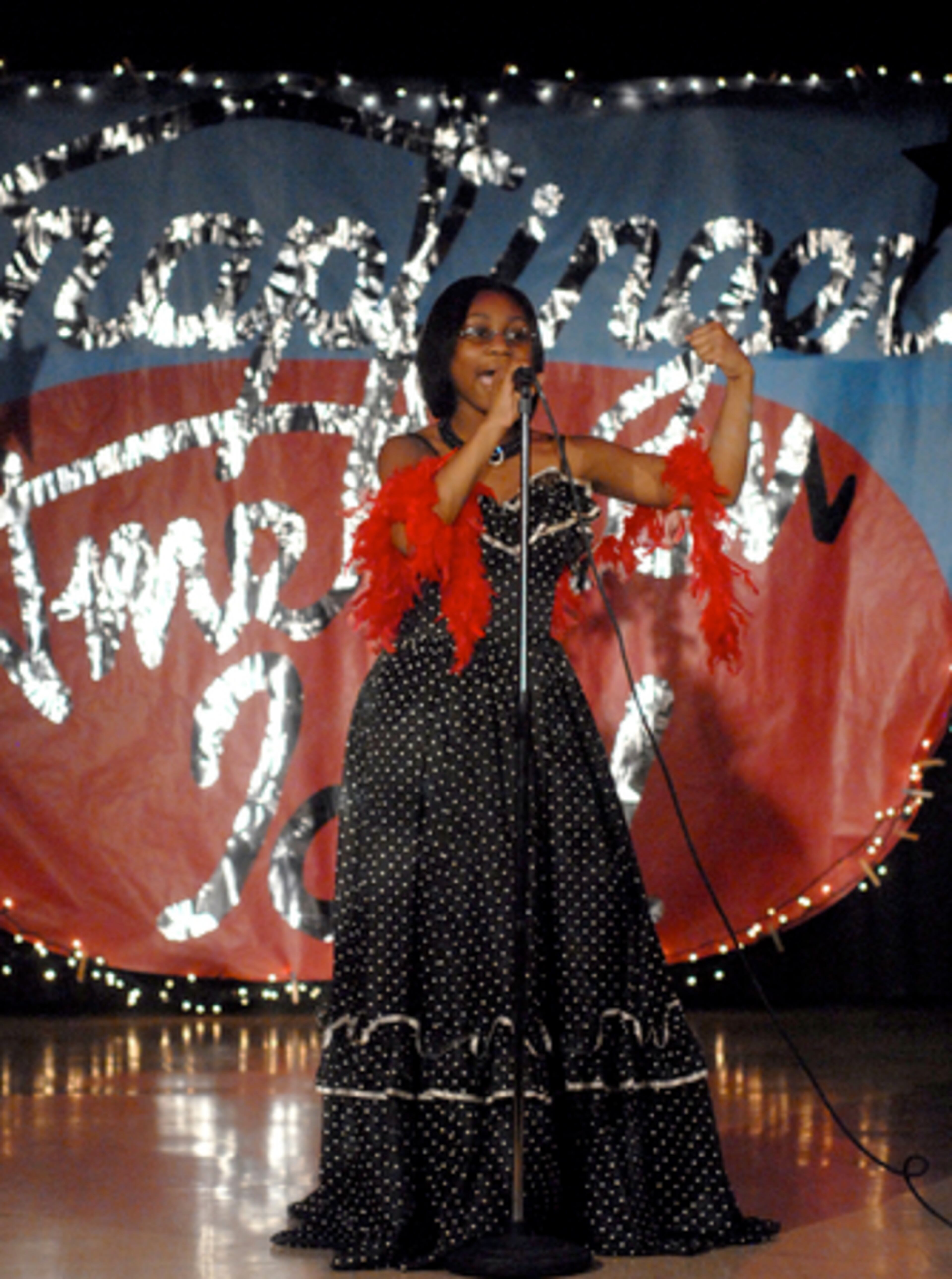 The program featured a number of Snapfinger students showcasing their singing, dancing, and rapping talents. Here Tyler Bacon-Long flexes both her her muscles and her pipes while singing 'My Guy.'