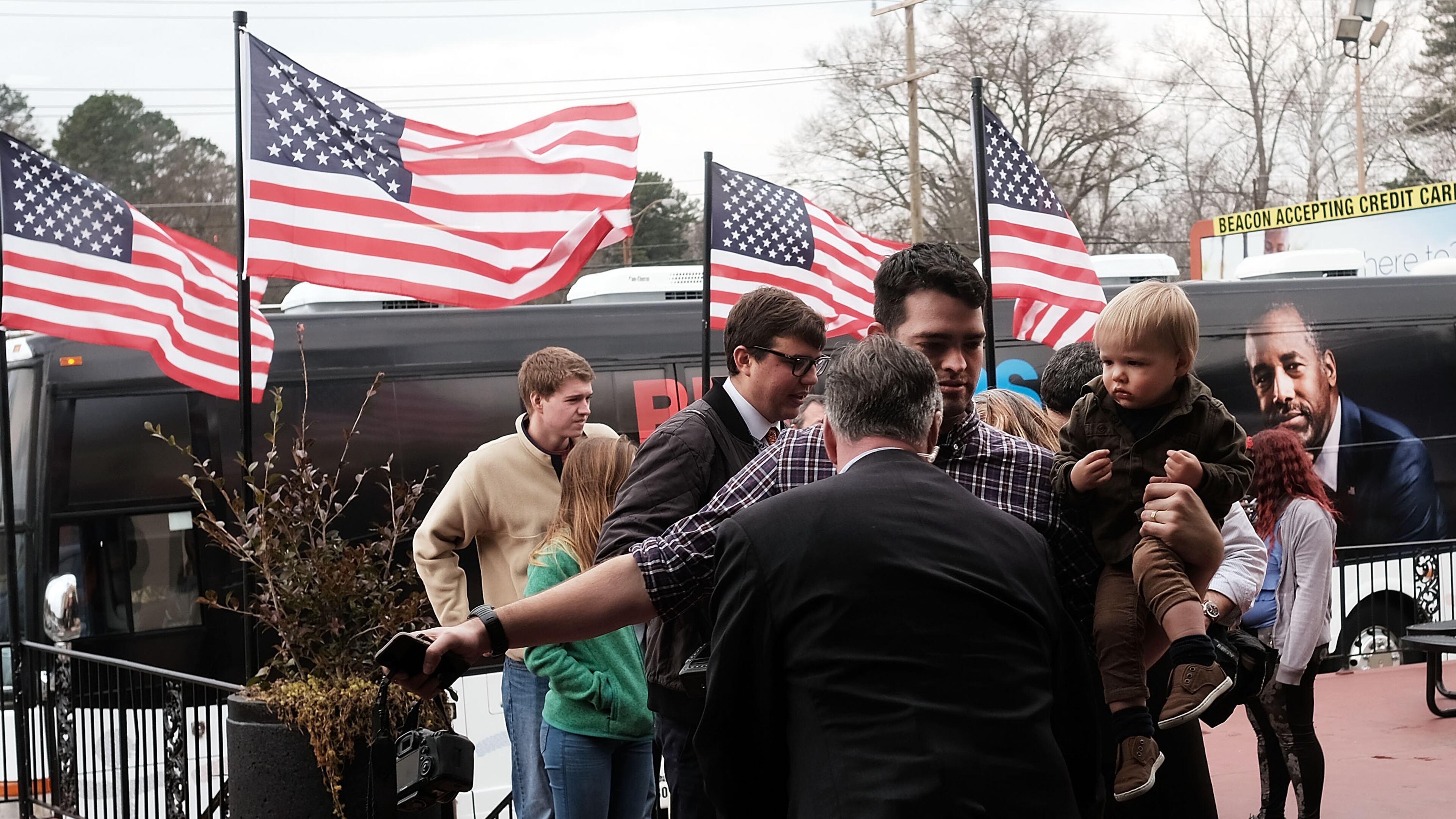 SPARTANBURG, SC - FEBRUARY 20: People are searched by the Secret Service as Republican presidential candidate Ben Carson visits voters in a restaurant during the Republican presidential primary on February 20, 2016 in Spartanburg, South Carolina. Polls show New York businessman Donald Trump leading his closest rival U.S. Sen. Ted Cruz (R-TX). (Photo by Spencer Platt/Getty Images)