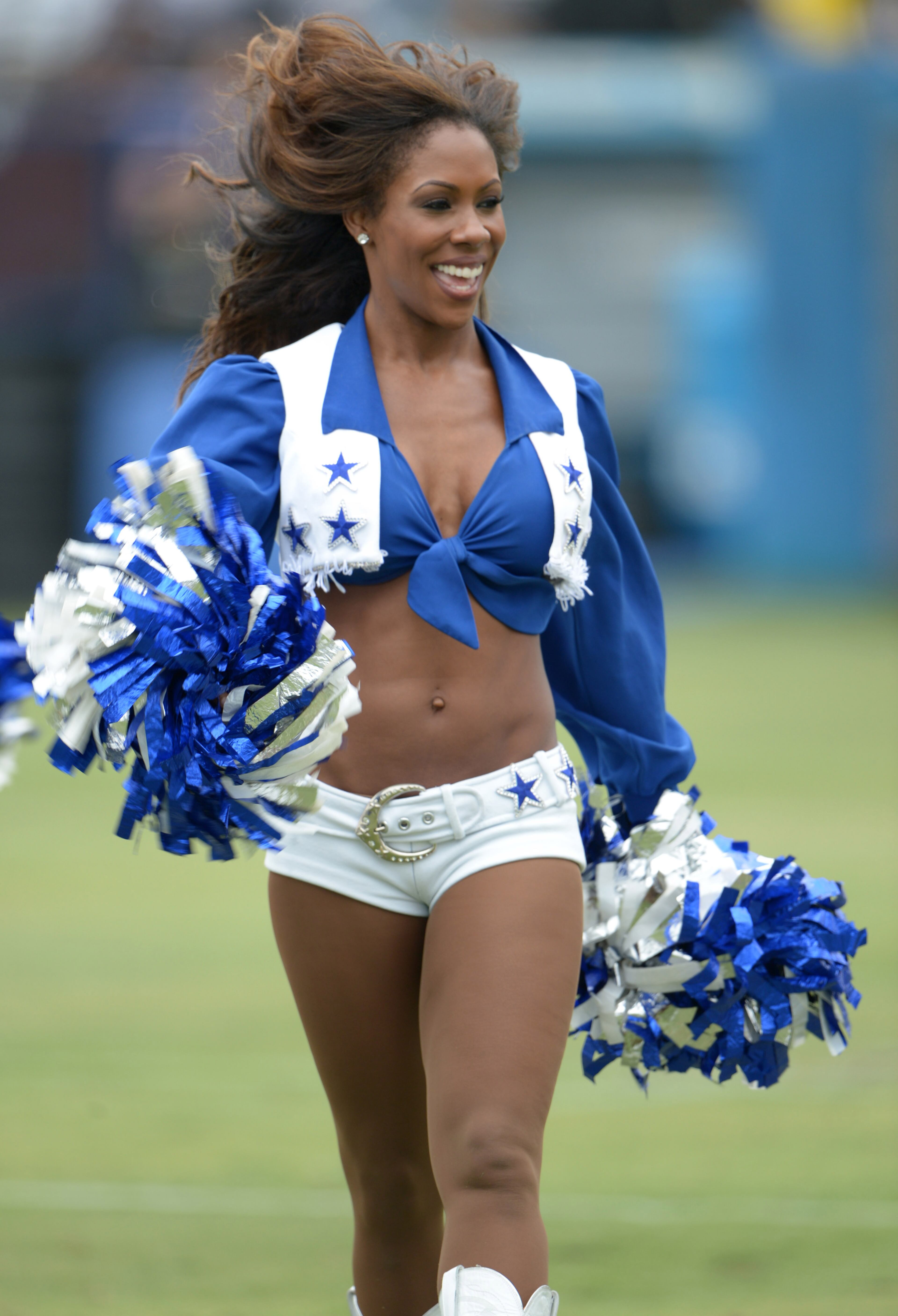 Cowboys cheerleader Jacqueline Bob smiles.