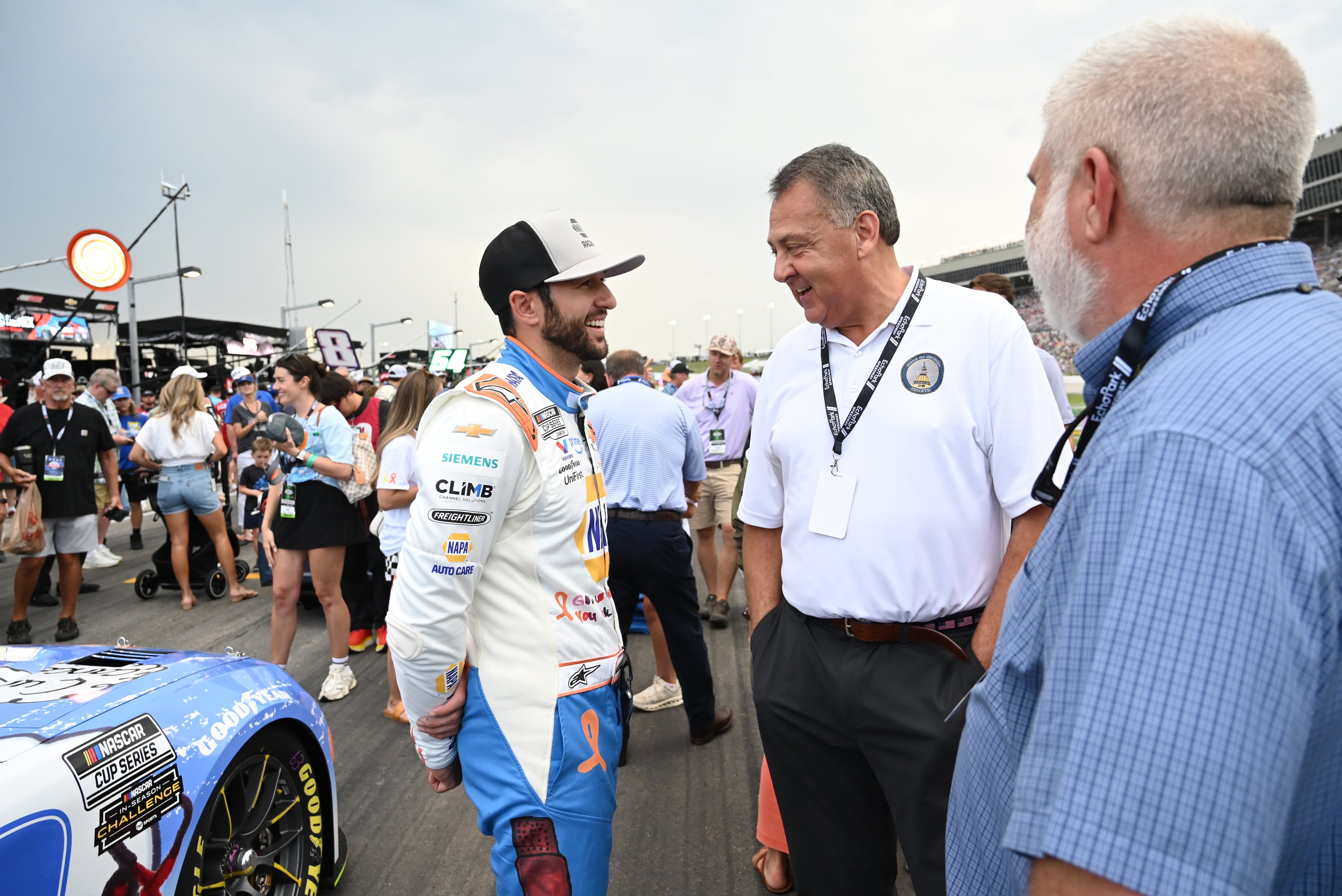 NASCAR Cup Series driver Chase Elliott is greeted by State Senator Steve Gooch before Quaker State 400 NASCAR Cup Series race at EchoPark Speedway, Saturday, June 28, 2025, in Hampton. (Hyosub Shin / AJC)