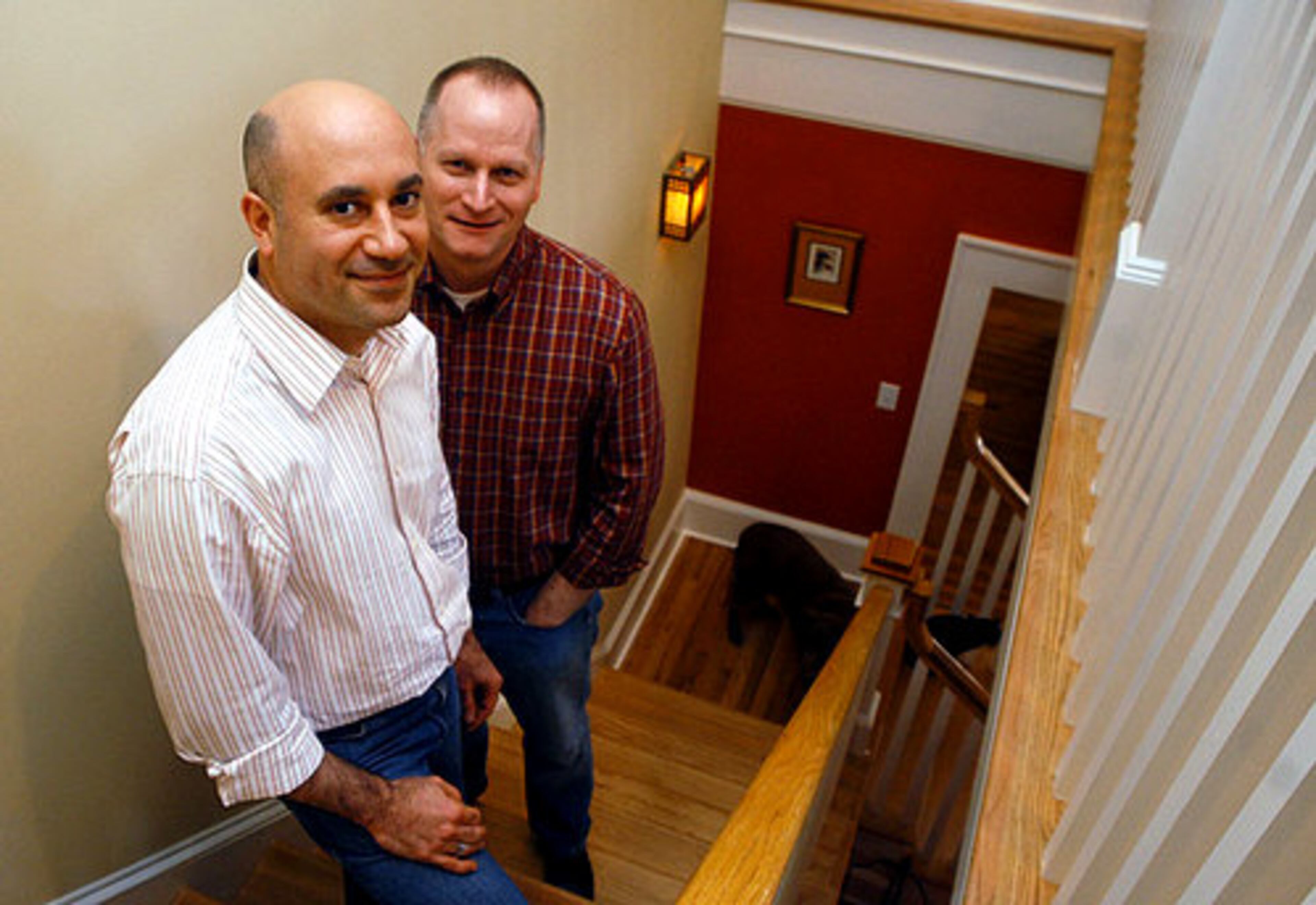 Santiago (left) and Hoppert made sure their addition of a second floor maintained the character of the original Virginia-Highland bungalow.