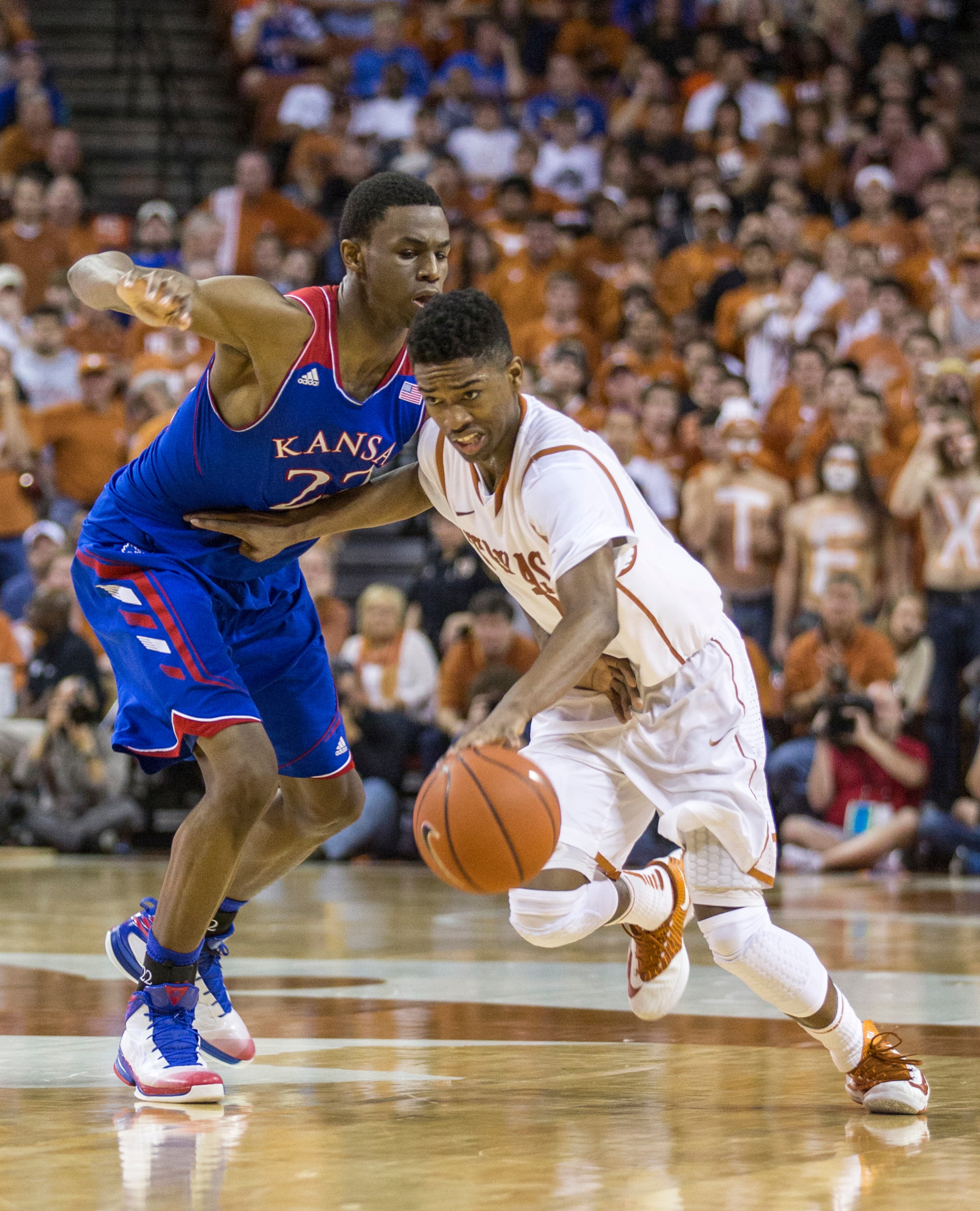 Texas Longhorns Isaiah Taylor drives against Kansas Jayhawks at the Frank Erwin Center on Saturday, Feb. 1, 2014.