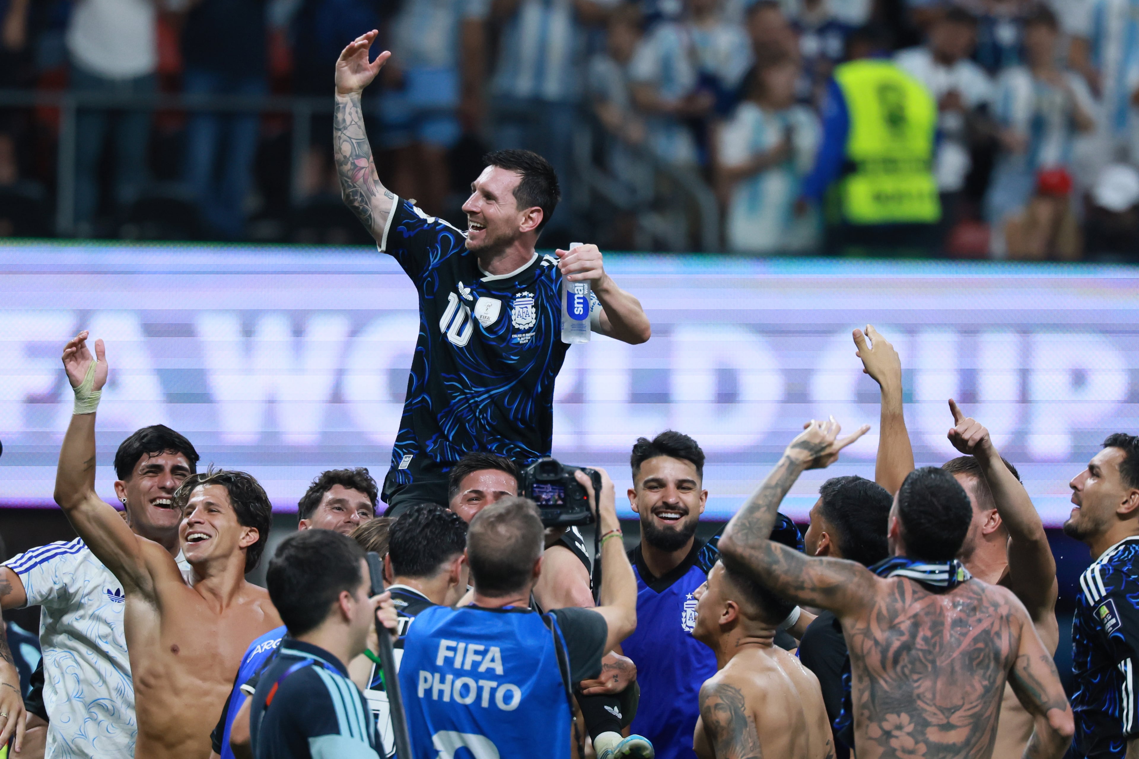 Argentina's Lionel Messi is lifted on the shoulders of teammates following victory over in Argentina vs. England FIFA World Cup Semifinal match at Atlanta Stadium (Mercedes-Benz Stadium) on Wednesday, July 15, 2026. (Jason Getz/AJC)