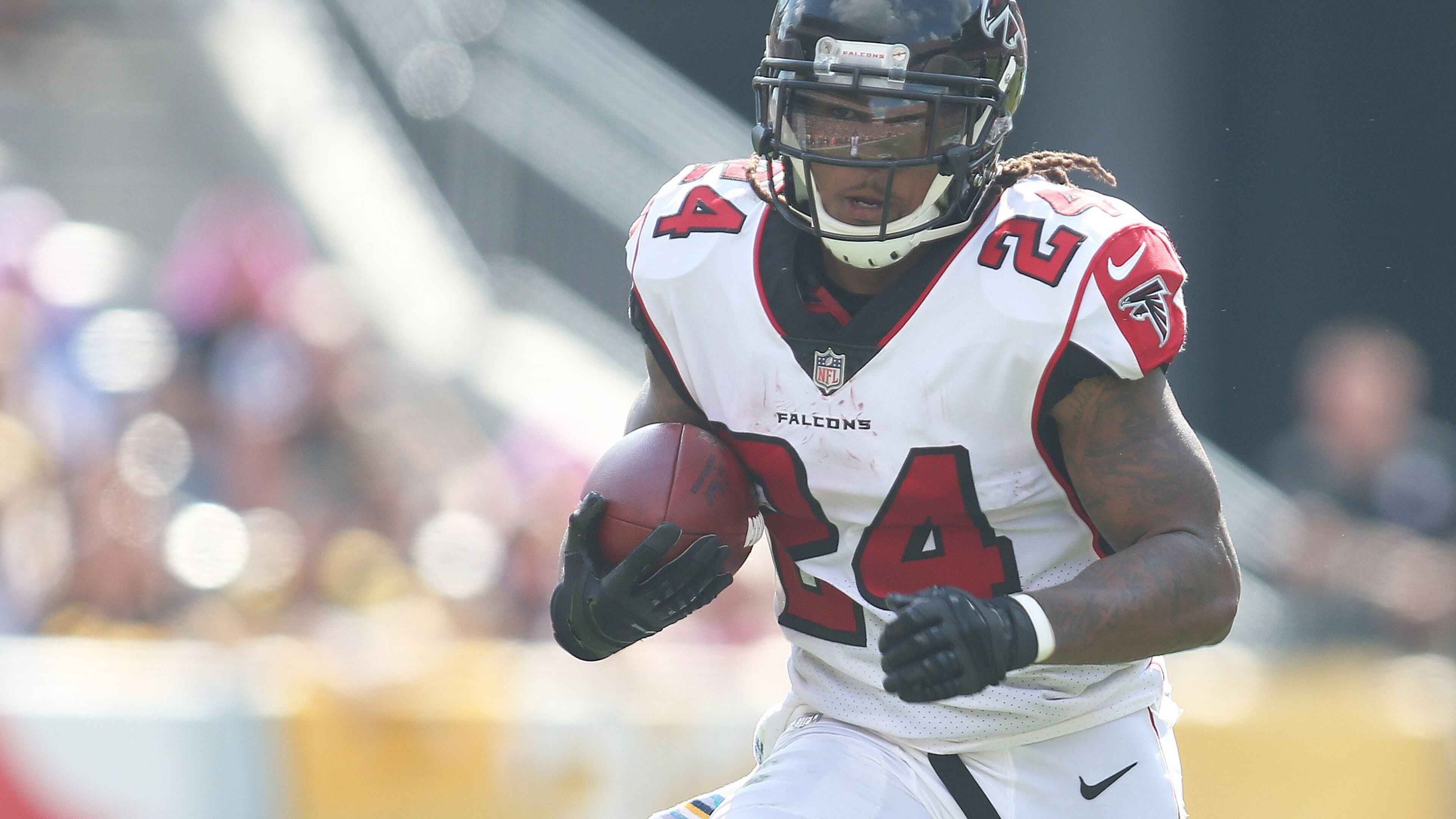 Atlanta Falcons running back Devonta Freeman (24) rushes the ball against the Pittsburgh Steelers during the second quarter at Heinz Field.